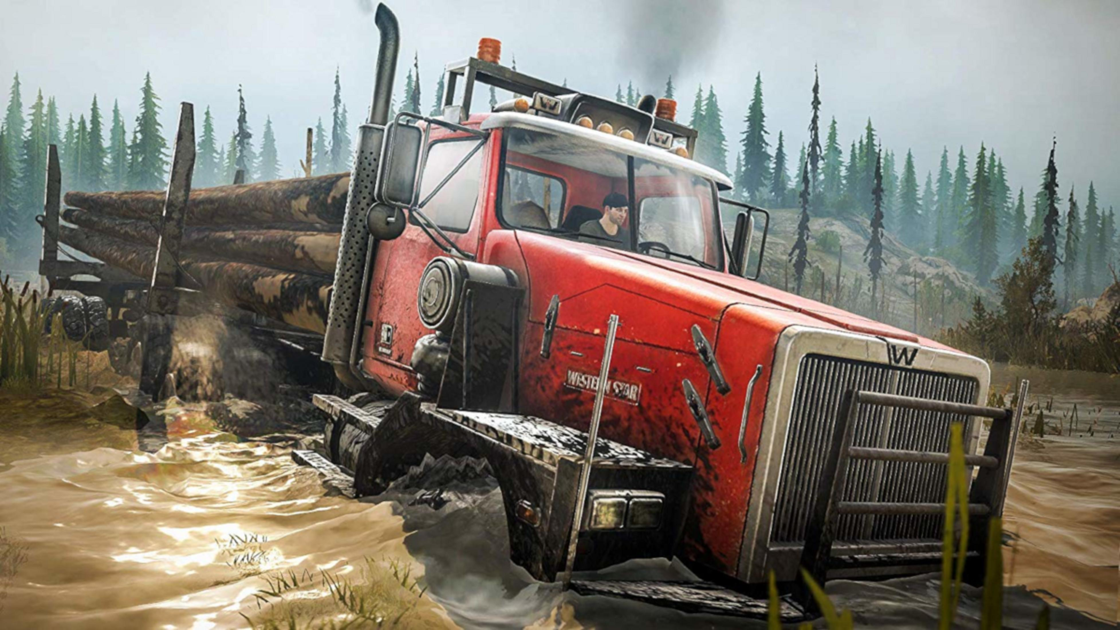 Ein roter Holztransporter fährt durch schlammiges Wasser, Bäume im Hintergrund.