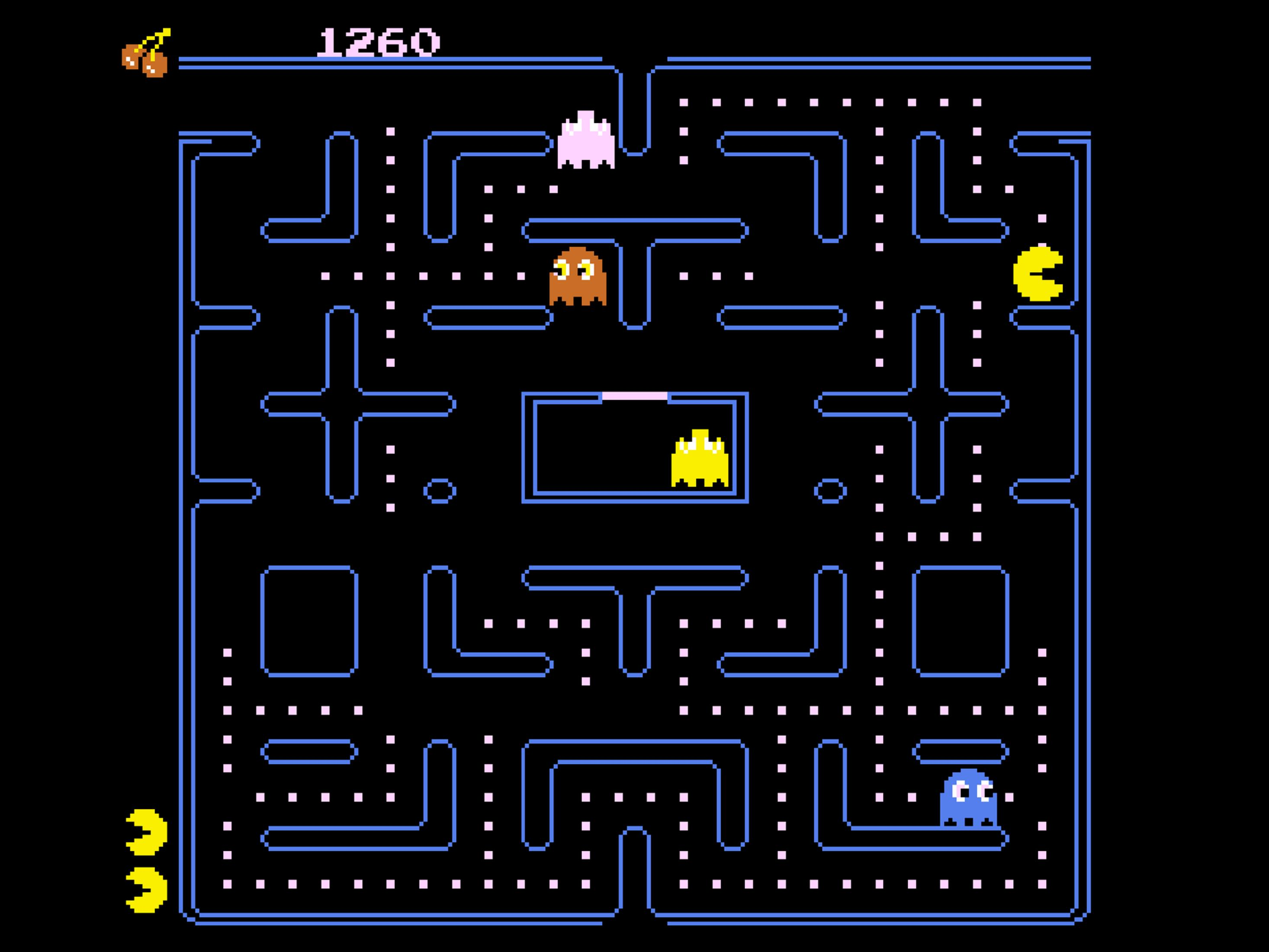 Pac-Man gioca in un labirinto con fantasmi e punti. Punteggio 1260.