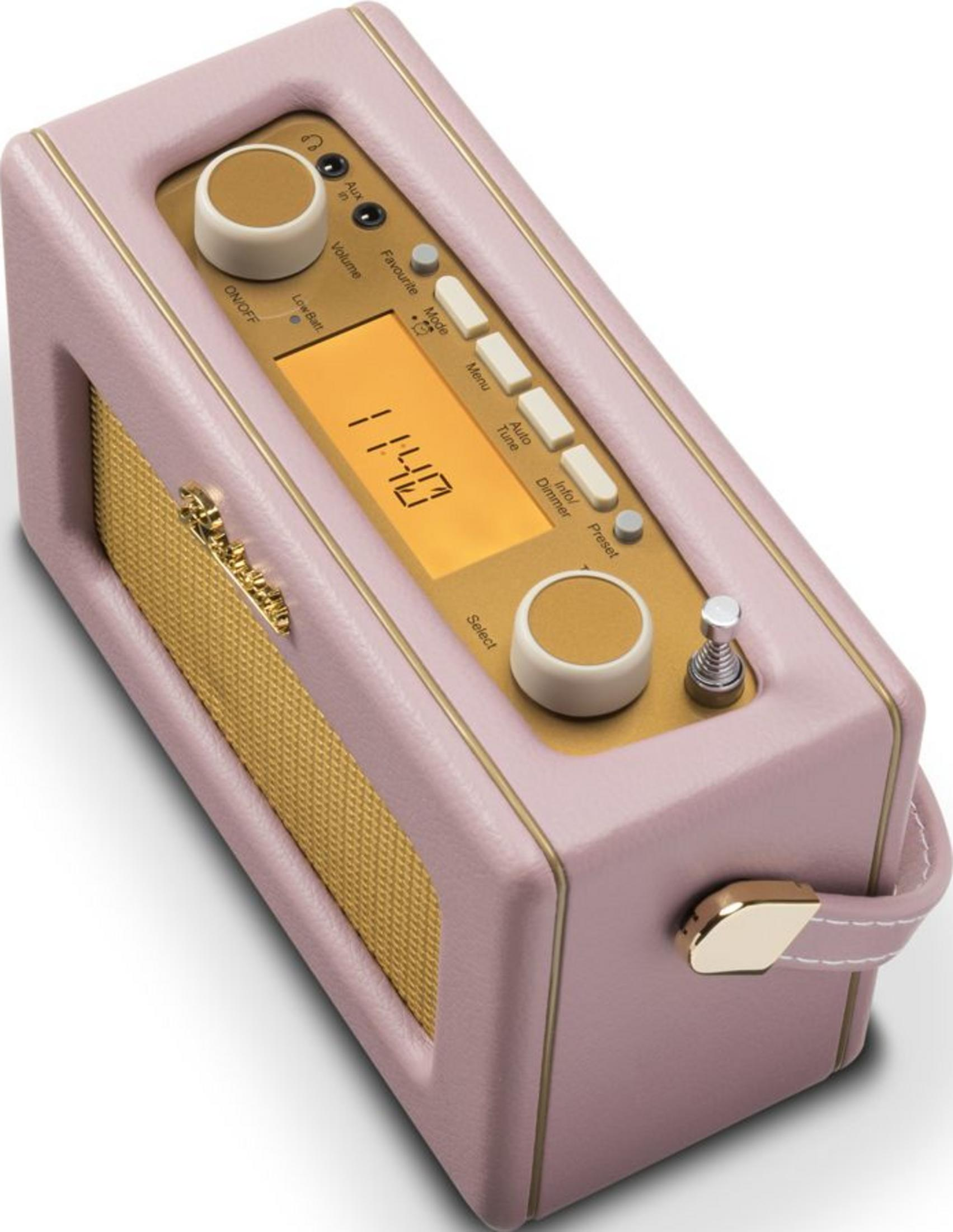 Una radio retrò rosa con accenti dorati e un display che mostra 11:40.