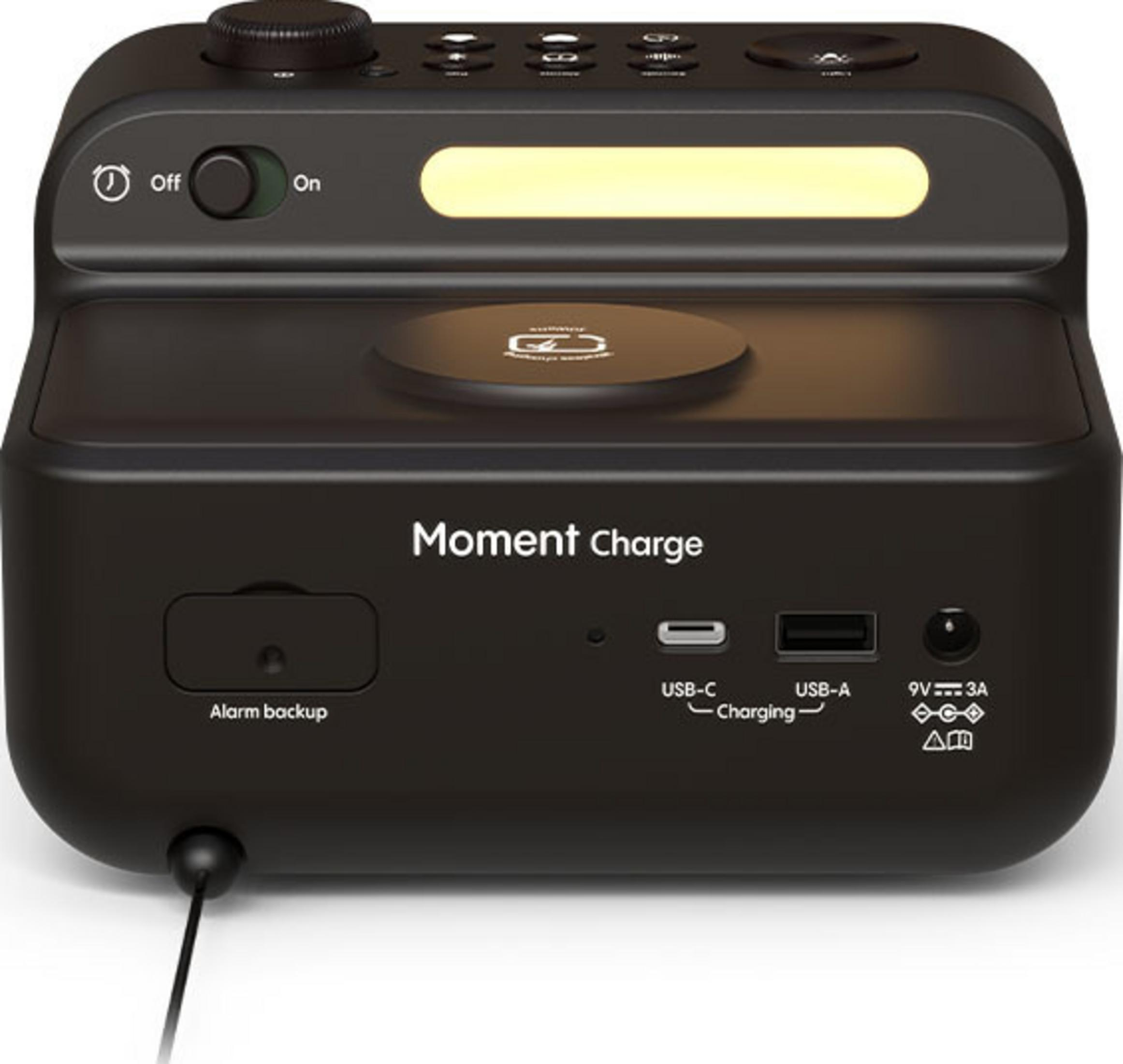 Cargador negro con respaldo de alarma, puertos USB-C, USB-A y 9V 3A.