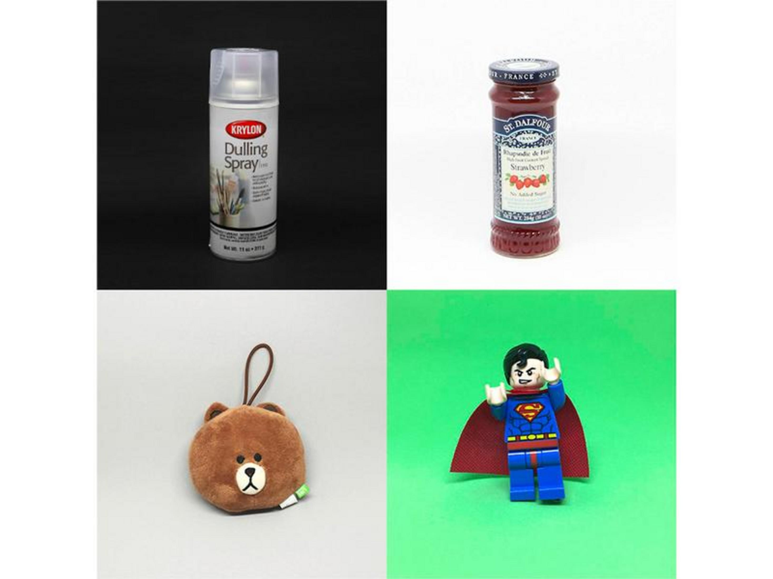 Vier Produkte: Sprühdose, Marmelade, Bärenanhänger, Superman-Figur.