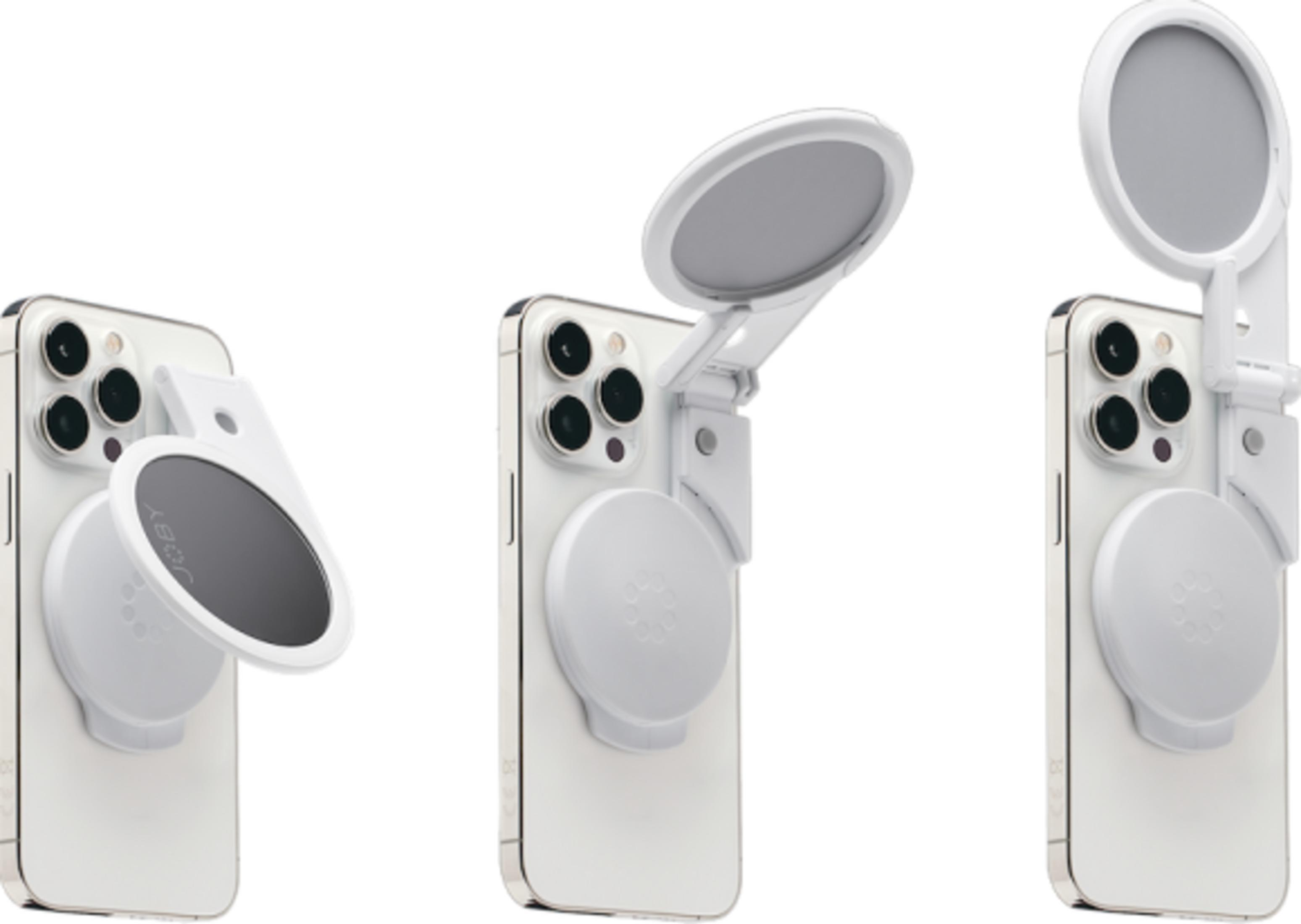 Ein weißes iPhone mit einem weißen magnetischen Handyzubehör, das auf der Rückseite angebracht ist.