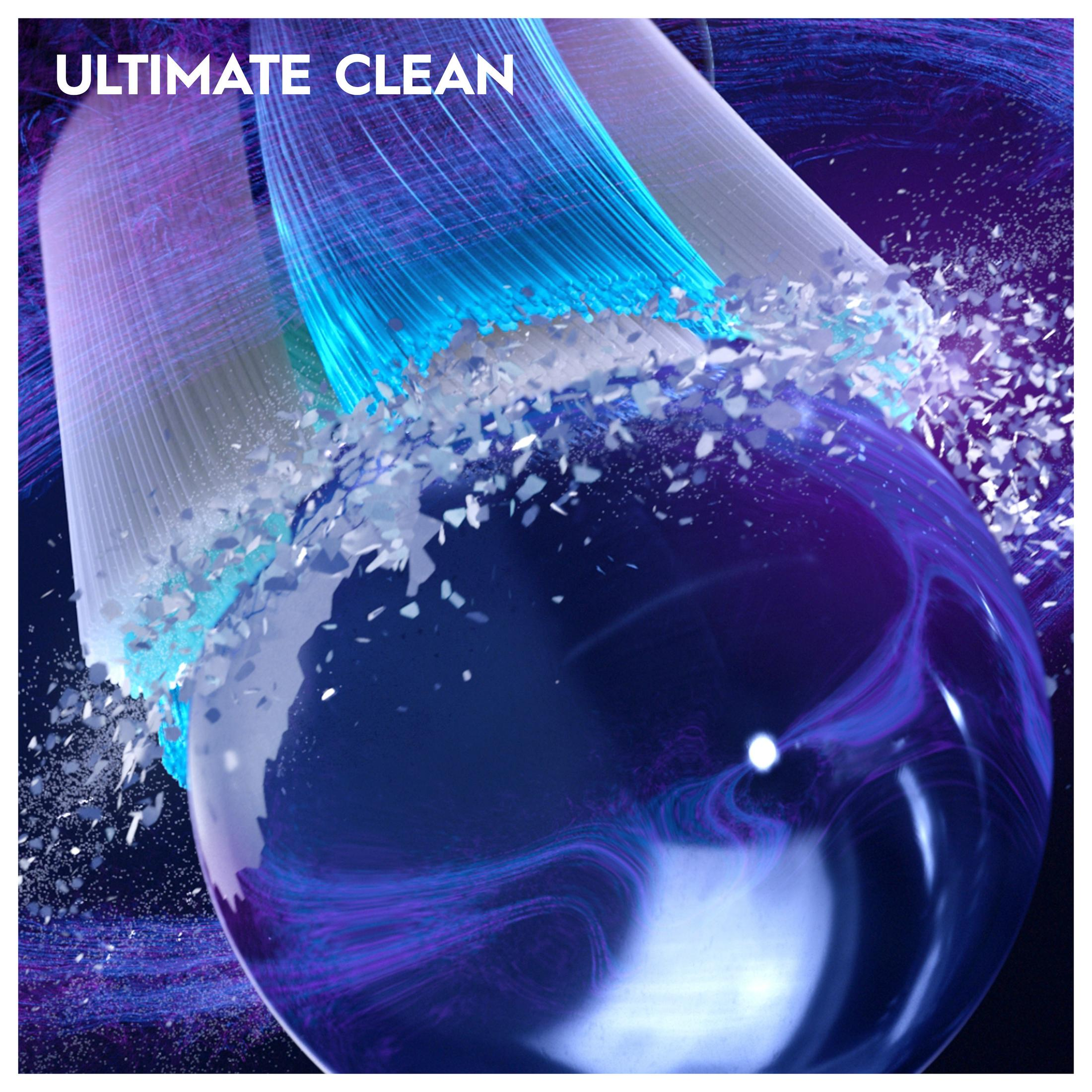 Szczoteczka do zębów czyści gładką kulę z niebieskimi i fioletowymi wirami.