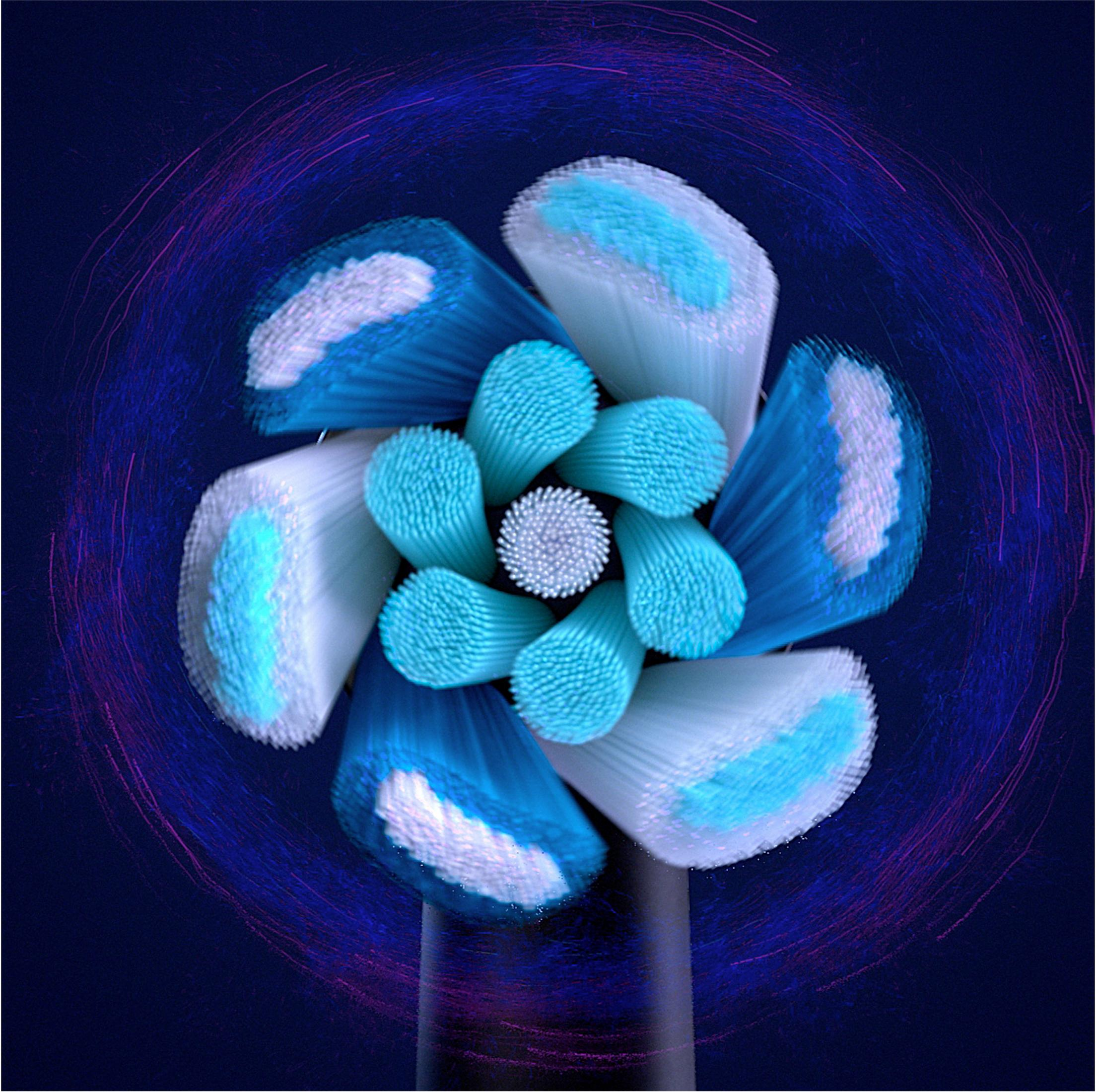 Un cabezal de cepillo de dientes eléctrico con cerdas azules y blancas sobre fondo oscuro.