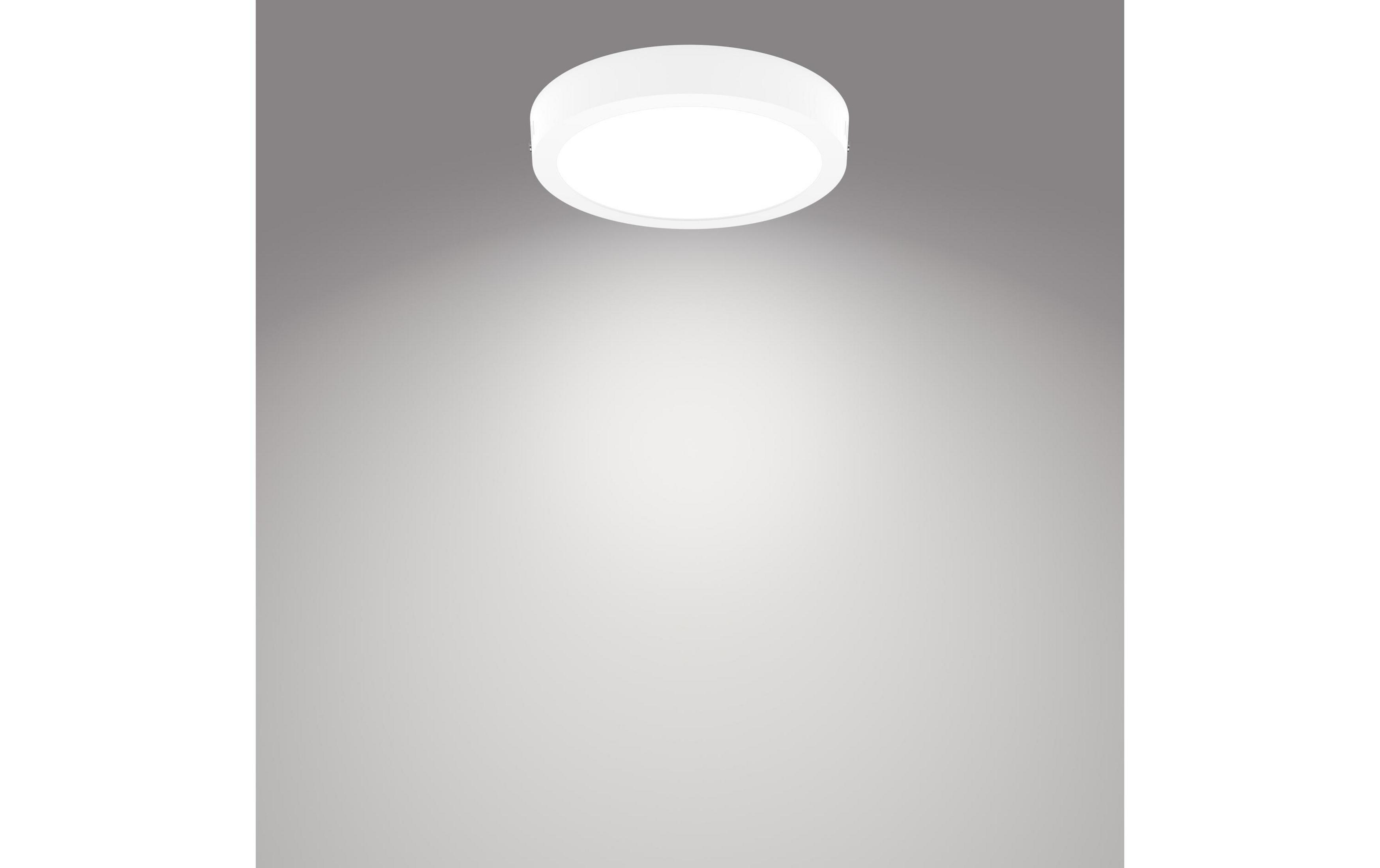 Una lámpara redonda blanca de techo con luz difusa sobre fondo gris.