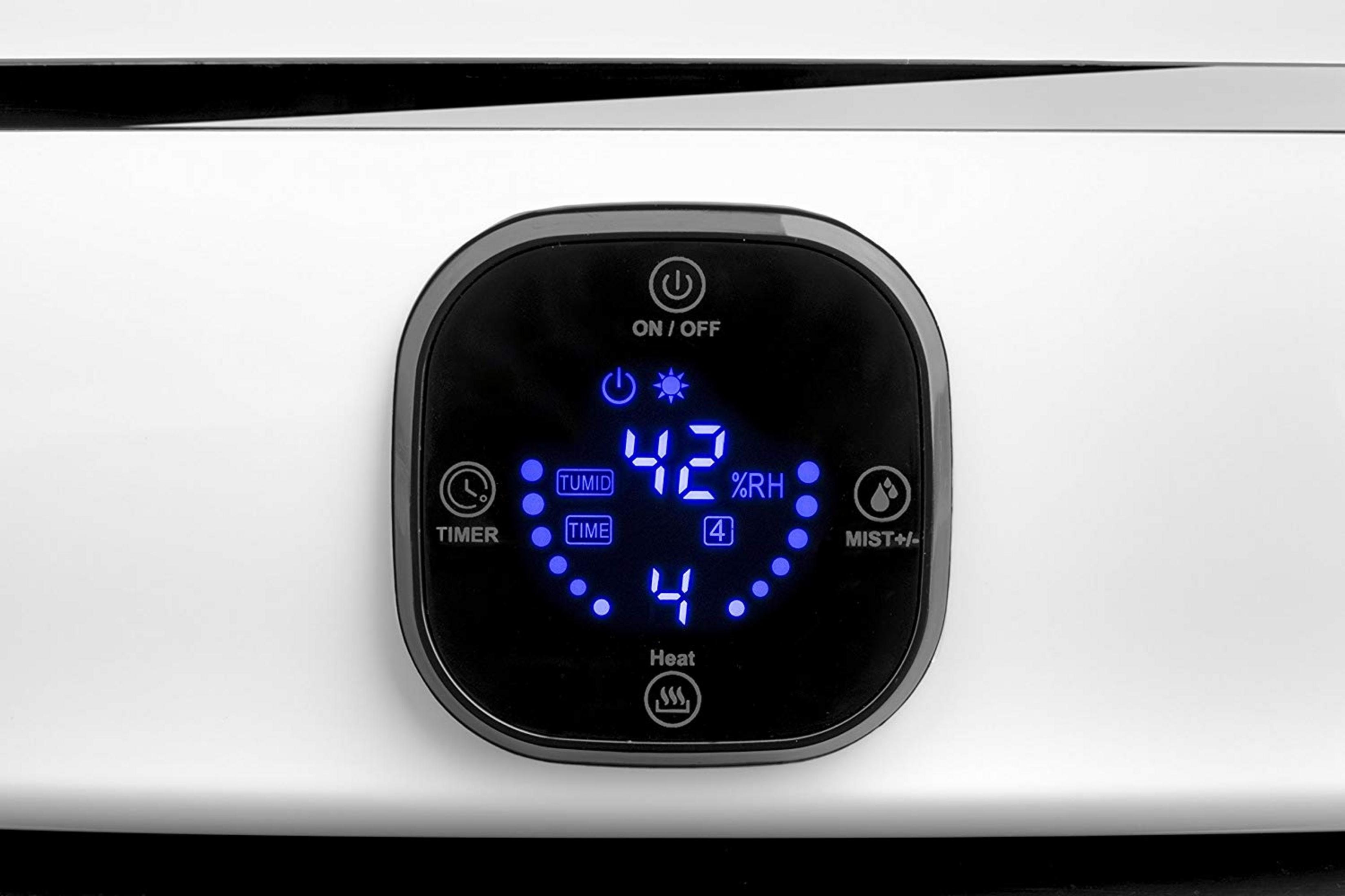 Pantalla digital de humidificador que muestra 42% de humedad y función de calor.