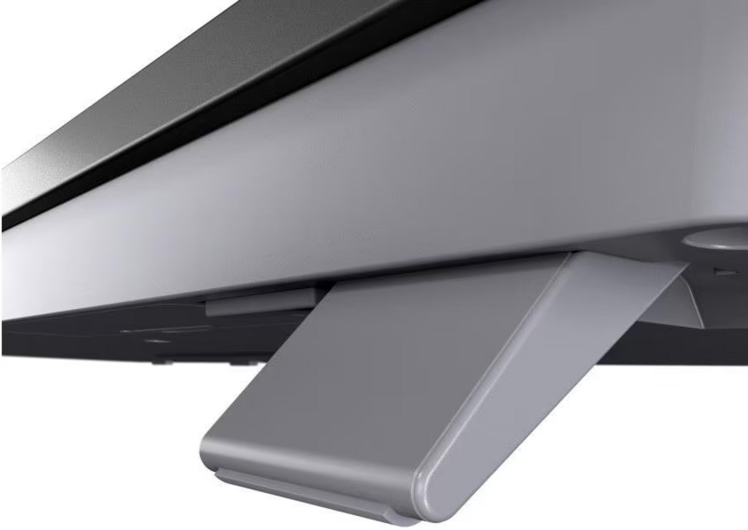 Szary stojak z czarną krawędzią monitora.