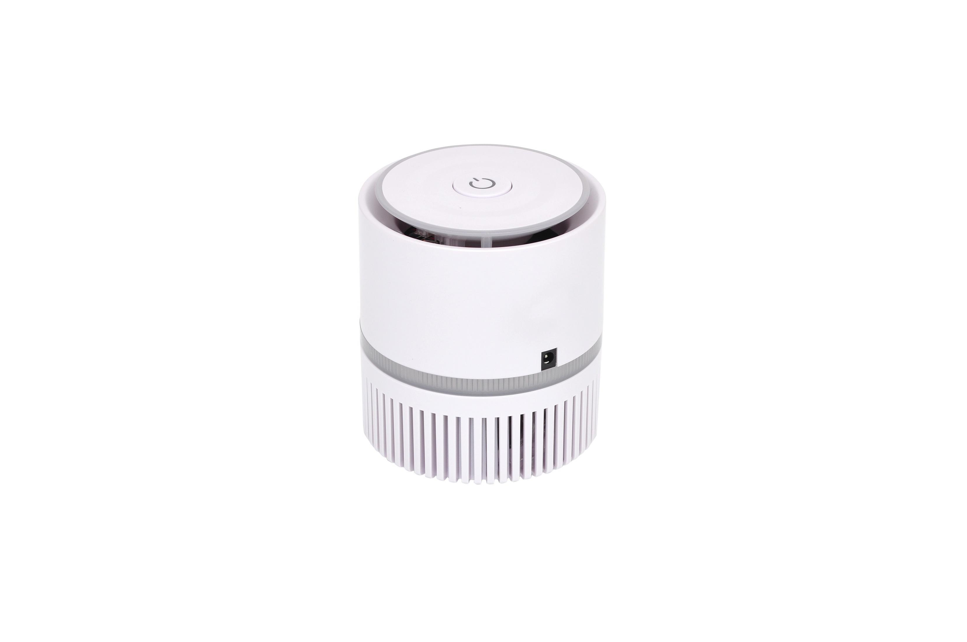 Un purificatore d'aria cilindrico bianco con un simbolo di accensione in alto.