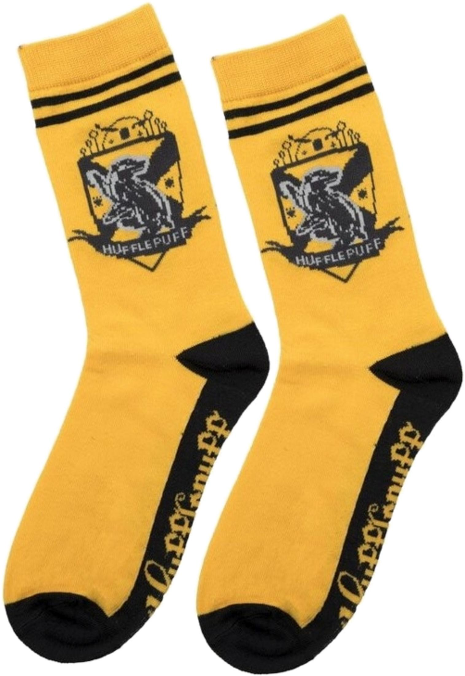 Gelbe Socken mit Hufflepuff-Logo und schwarzen Streifen.