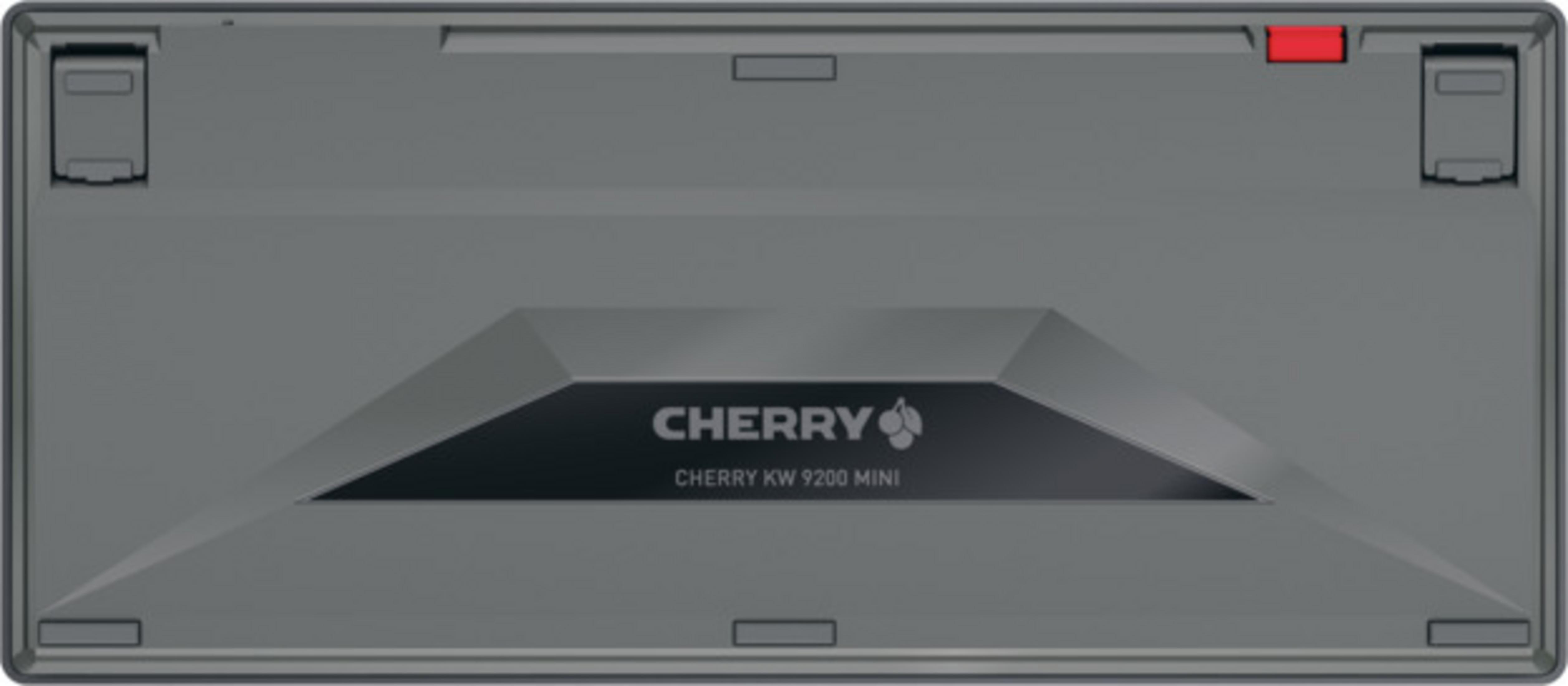Retro tastiera grigia Cherry KW 9200 Mini. Interruttore rosso nell'angolo in alto a destra.