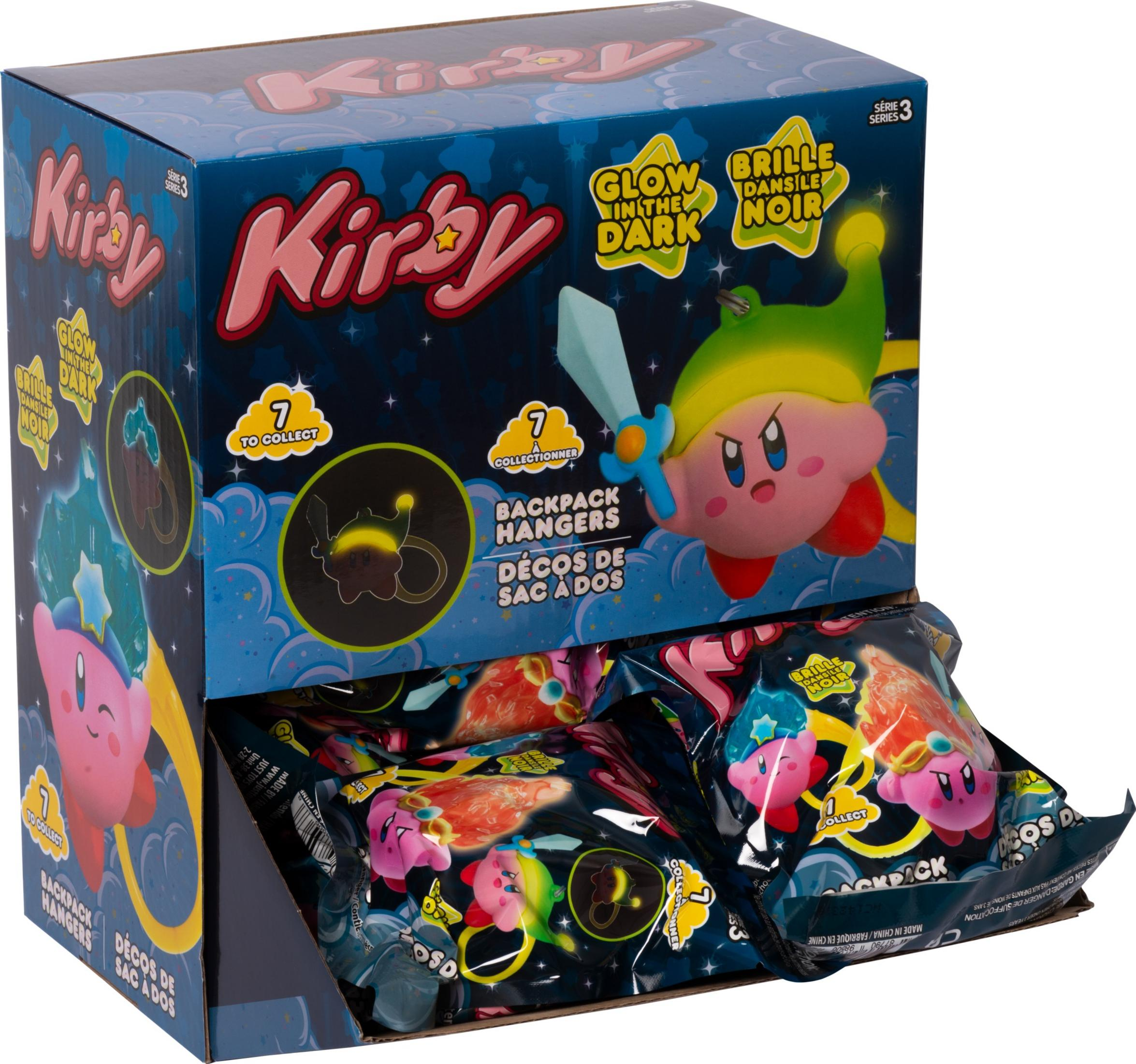 Verpackung von Kirby-Rucksackanhängern mit Kirby-Charakteren und Glow-in-the-Dark-Aufschriften.