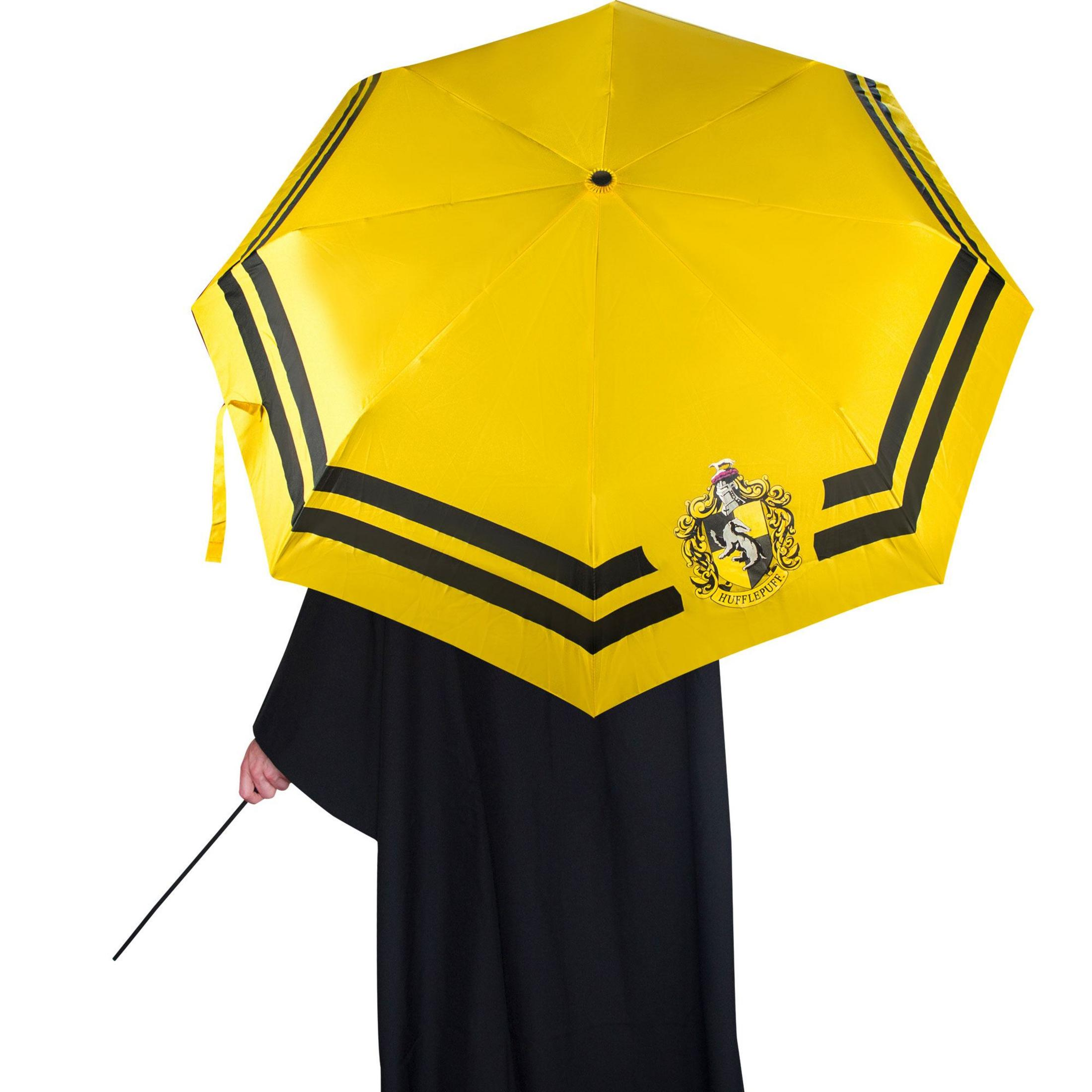 Paraguas amarillo con rayas negras y escudo de Hufflepuff.