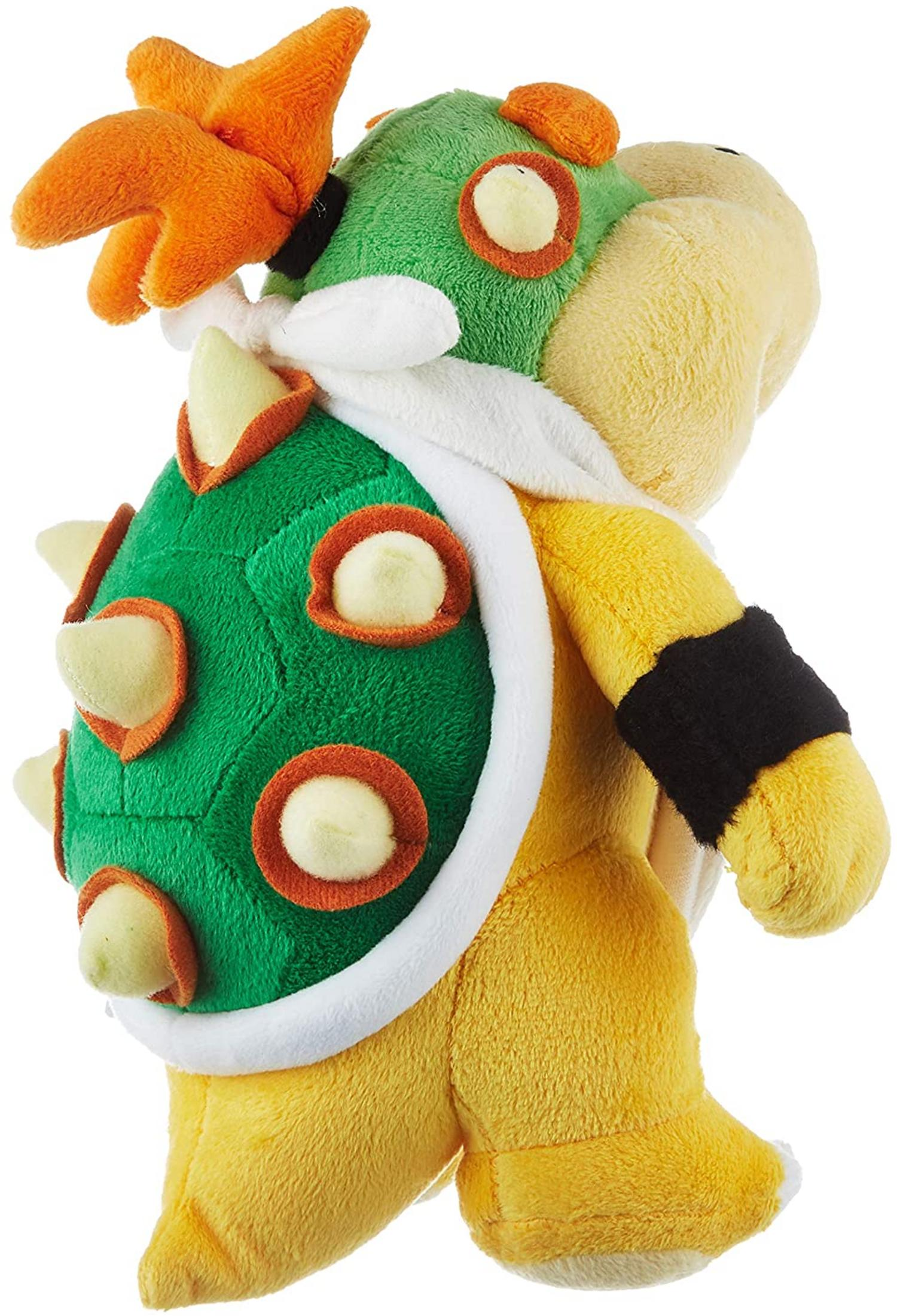 Plüschfigur von Bowser mit grünem Panzer, orangefarbenen Hörnern und gelbem Körper.