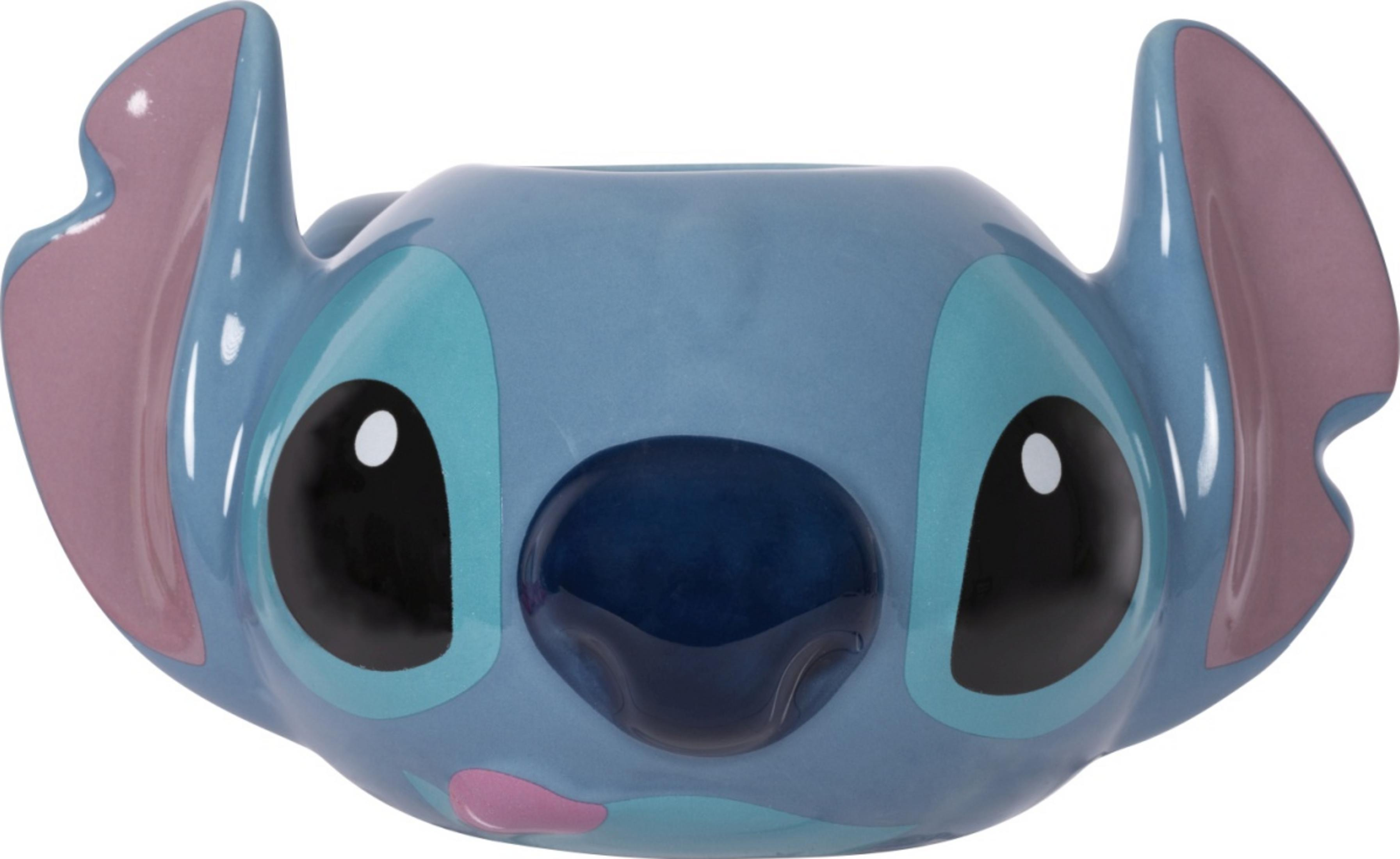 Eine blaue Tasse im Stil von Stitch mit großen schwarzen Augen und rosa Ohren.