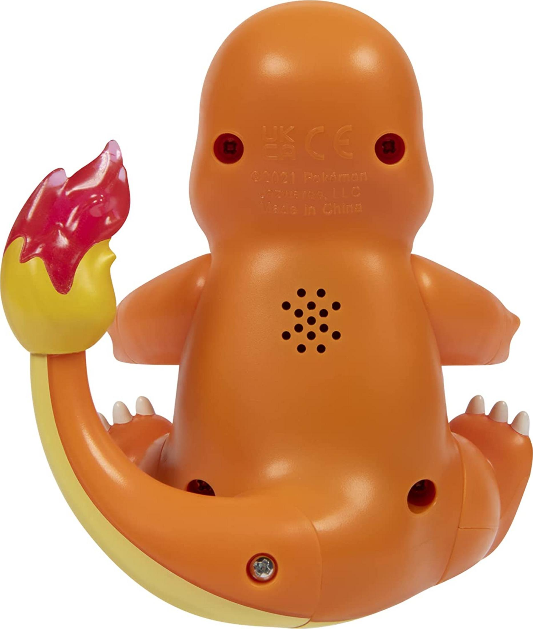 Orange Pokémon-Figur mit Flamme am Schwanz und Lautsprechergitter auf dem Rücken.