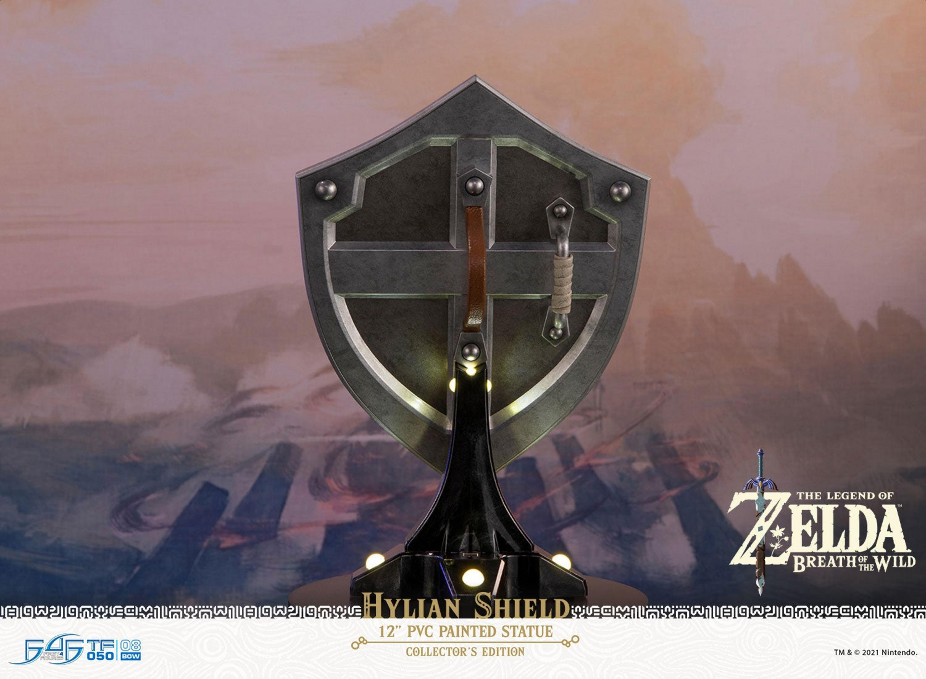 Ein Hylian Schild auf einem Ständer mit dem Zelda-Logo.