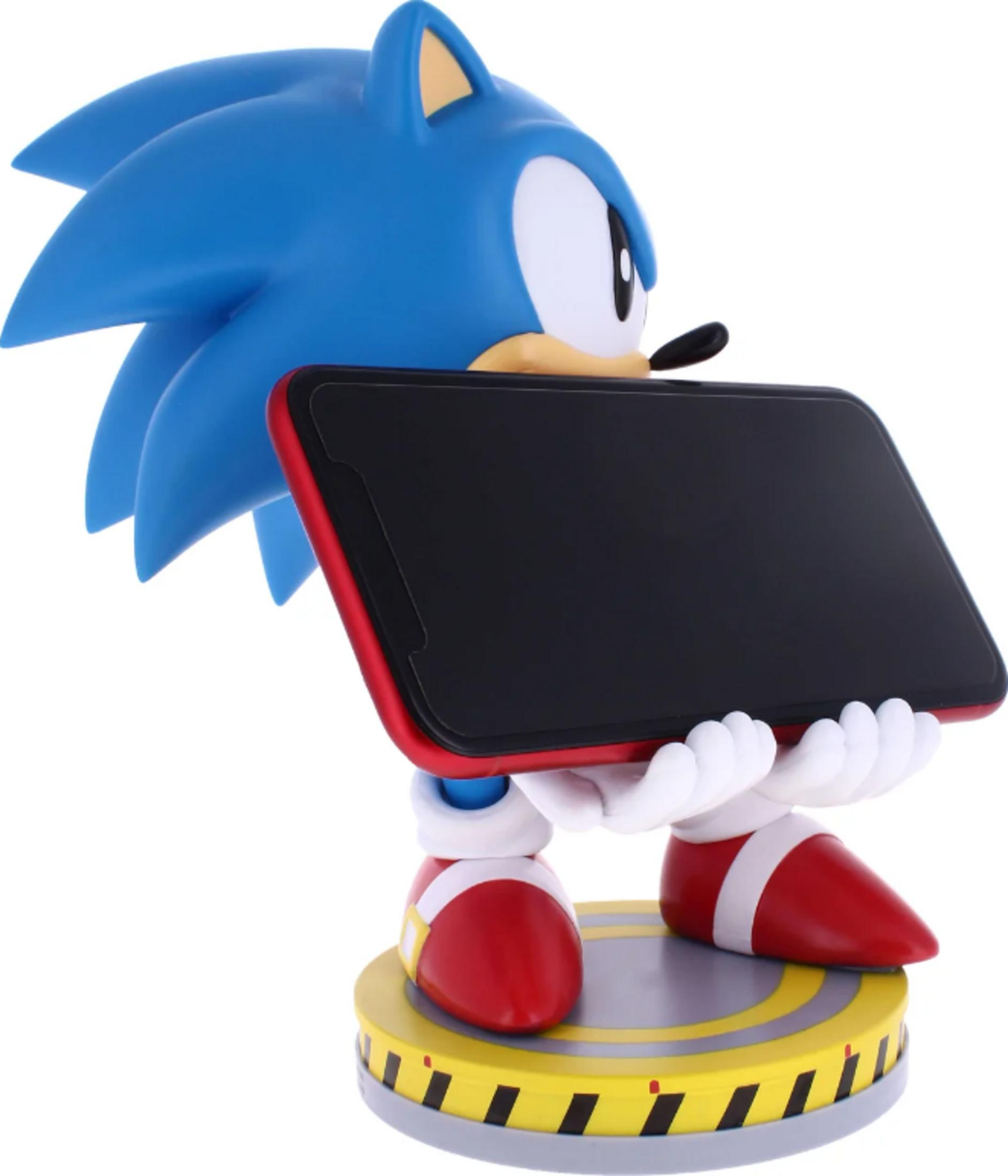 Sonic die Igel-Figur hält ein Smartphone mit rotem Rand.