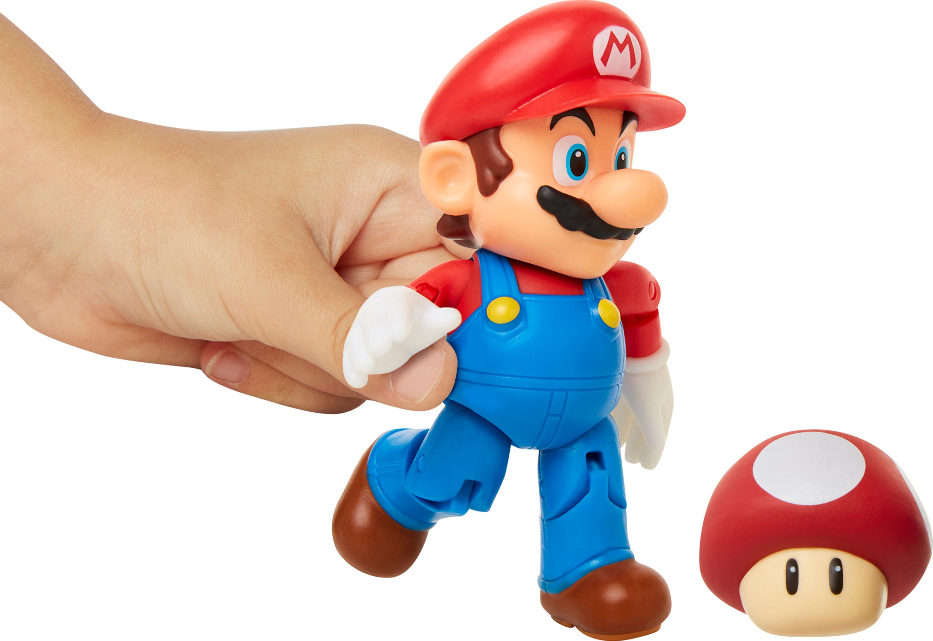 Figura de Mario con gorra roja, peto azul y una seta.