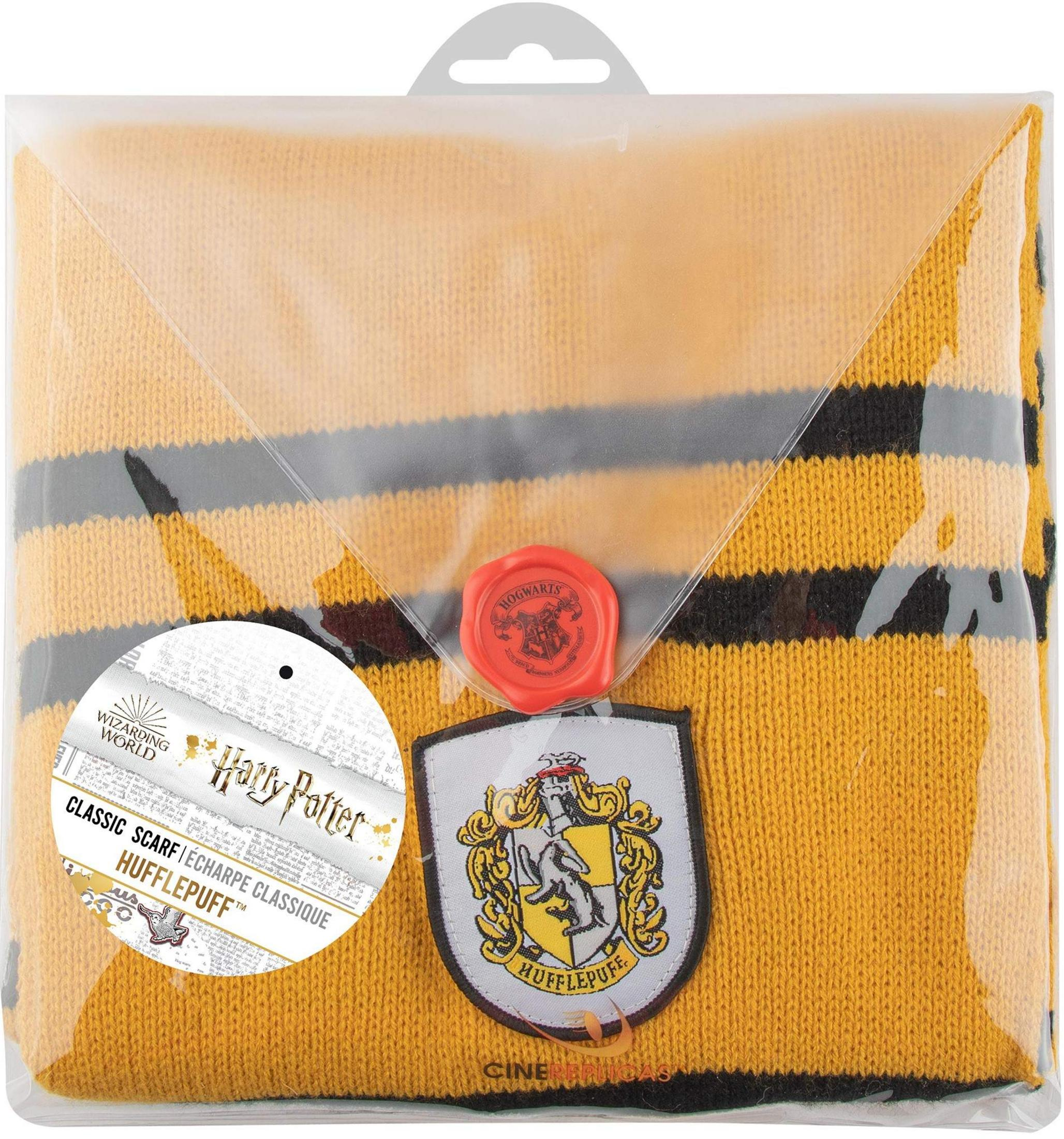 Ein gelb-schwarz gestreifter Hufflepuff-Schal im Harry-Potter-Design, verpackt in Plastik.