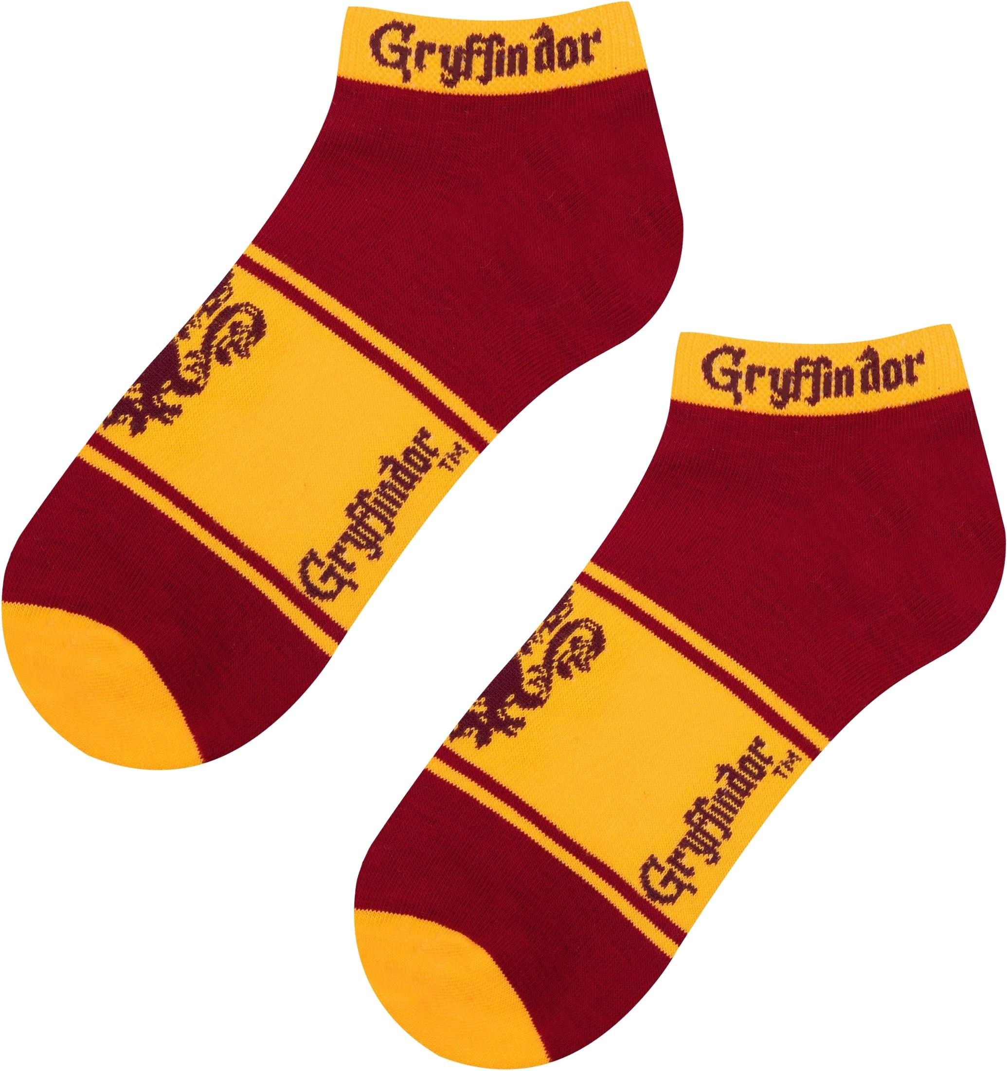 Zwei rot-gelbe Socken mit Gryffindor-Schriftzug und Logo.