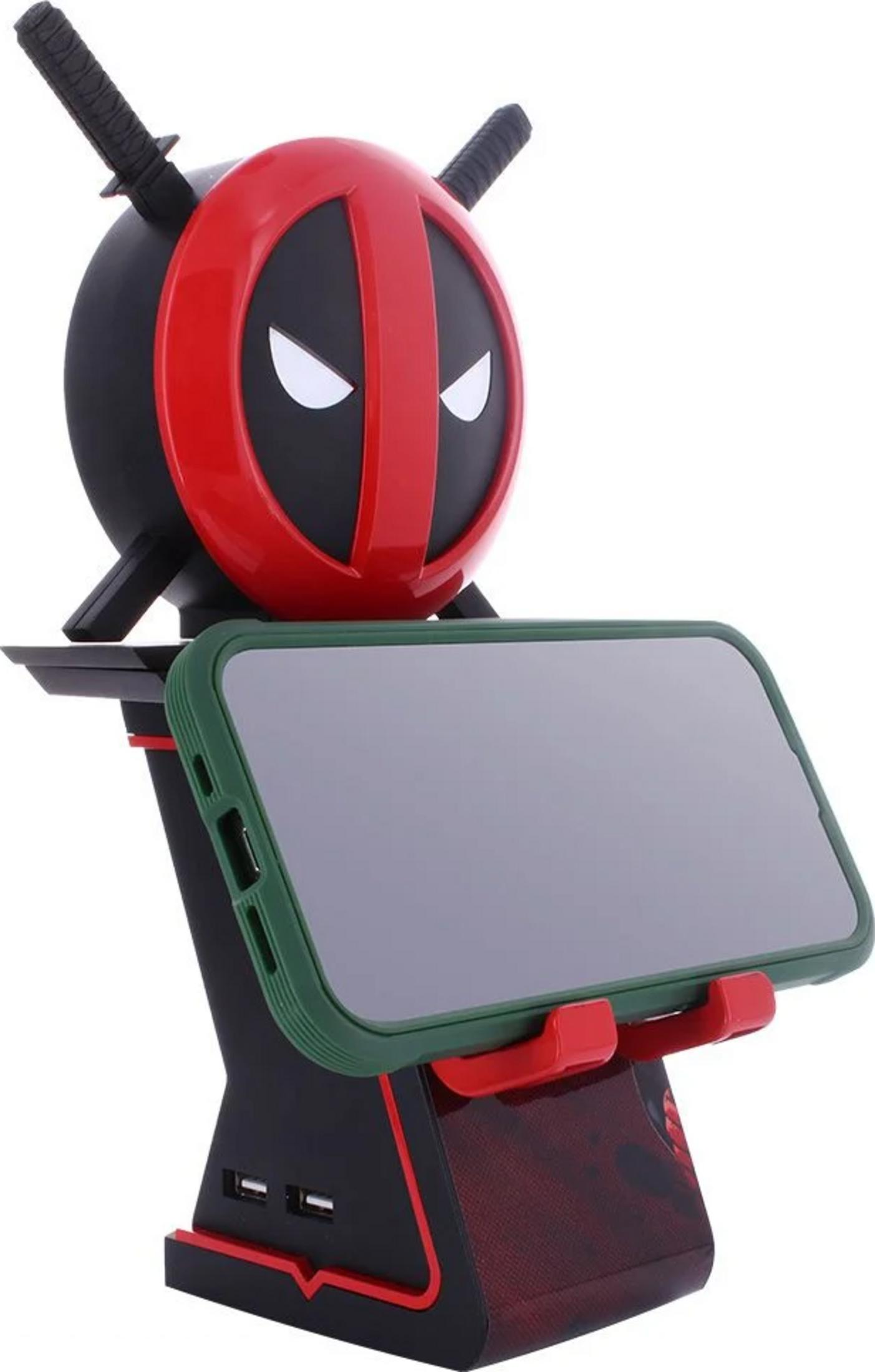 Supporto Deadpool che tiene uno smartphone. Con spade sulla testa e porte USB.