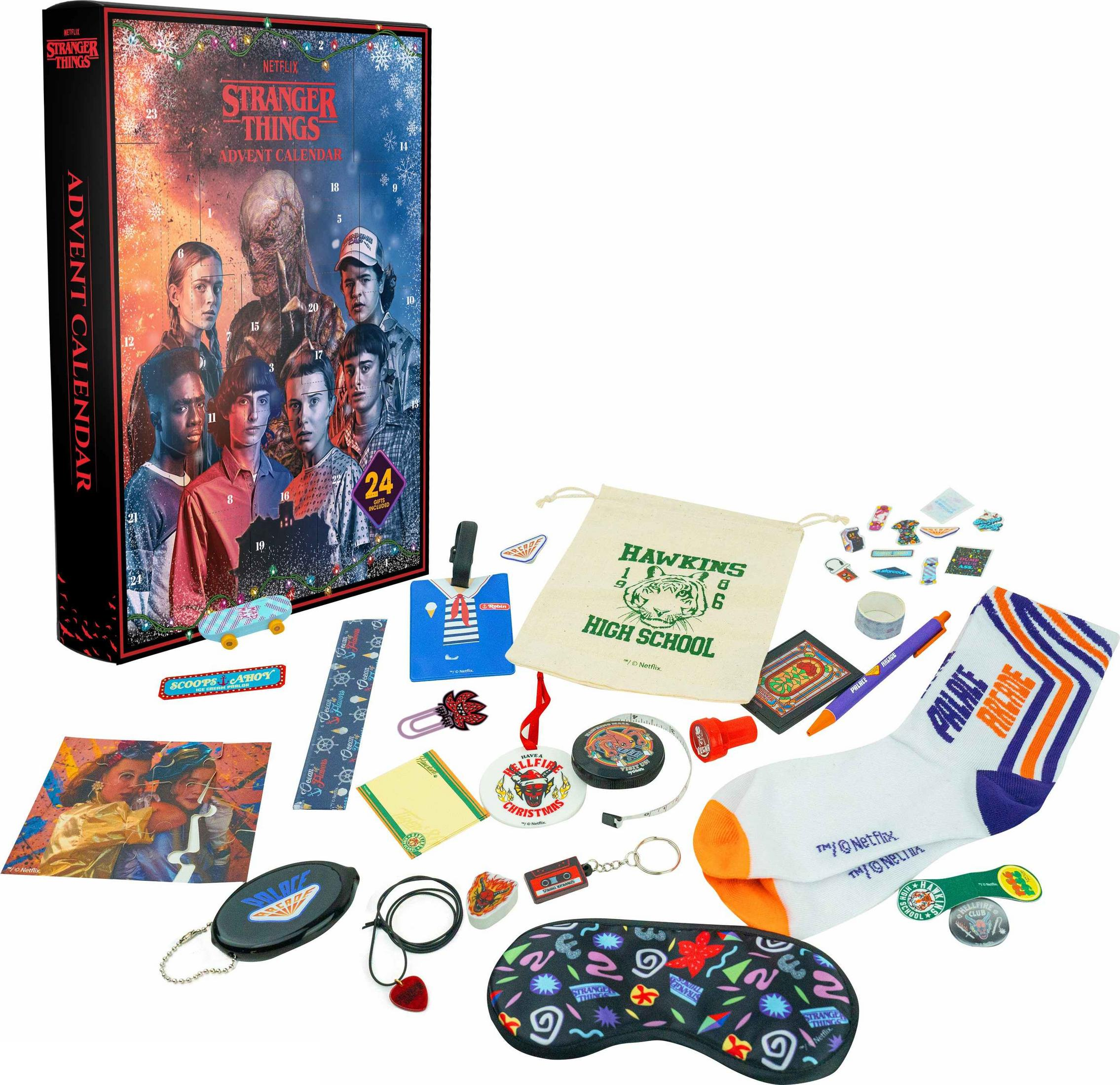 Calendrier de l'avent Stranger Things avec figurines et accessoires sur fond blanc.