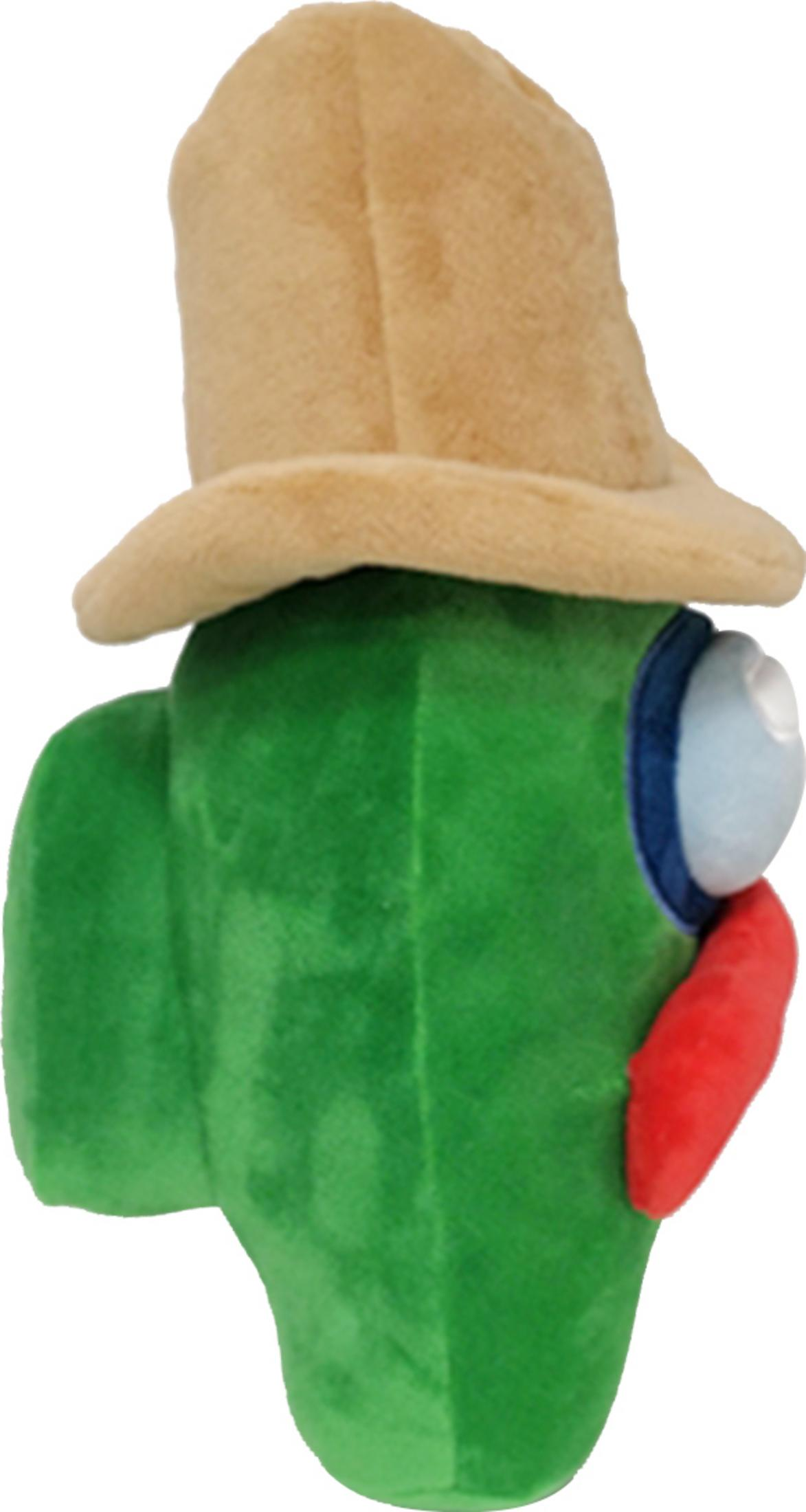 Grüne Plüschfigur mit Hut und rotem Mundstück.