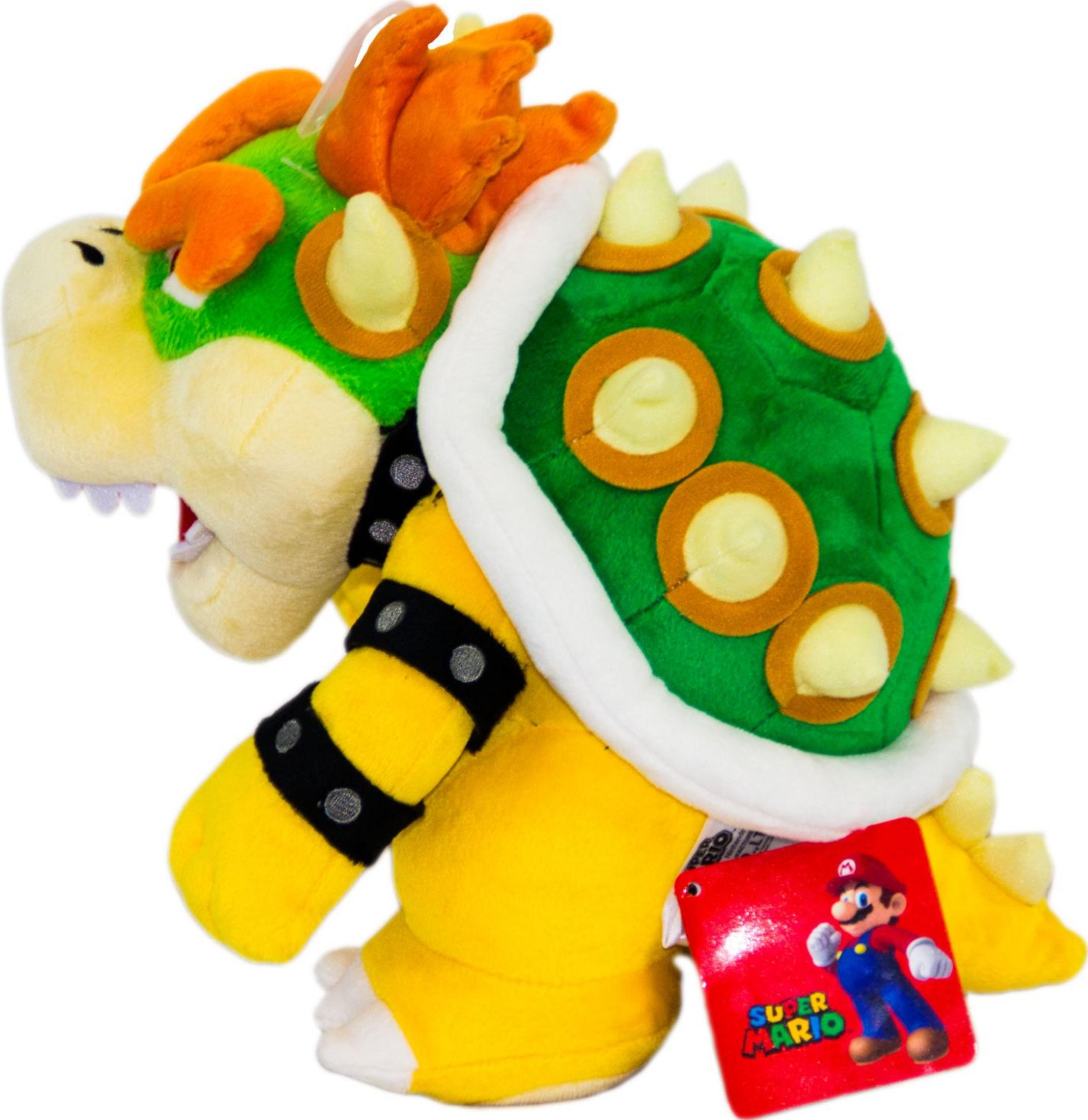 Ein gelber Plüsch-Bowser mit grüner stacheliger Schale und orangem Haar.