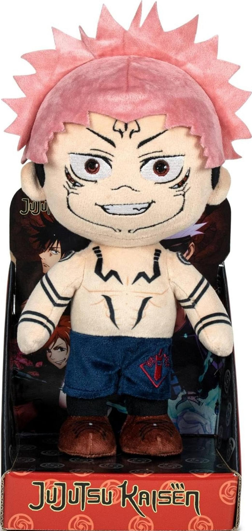Une peluche Jujutsu Kaisen aux cheveux roses et vêtements sombres.