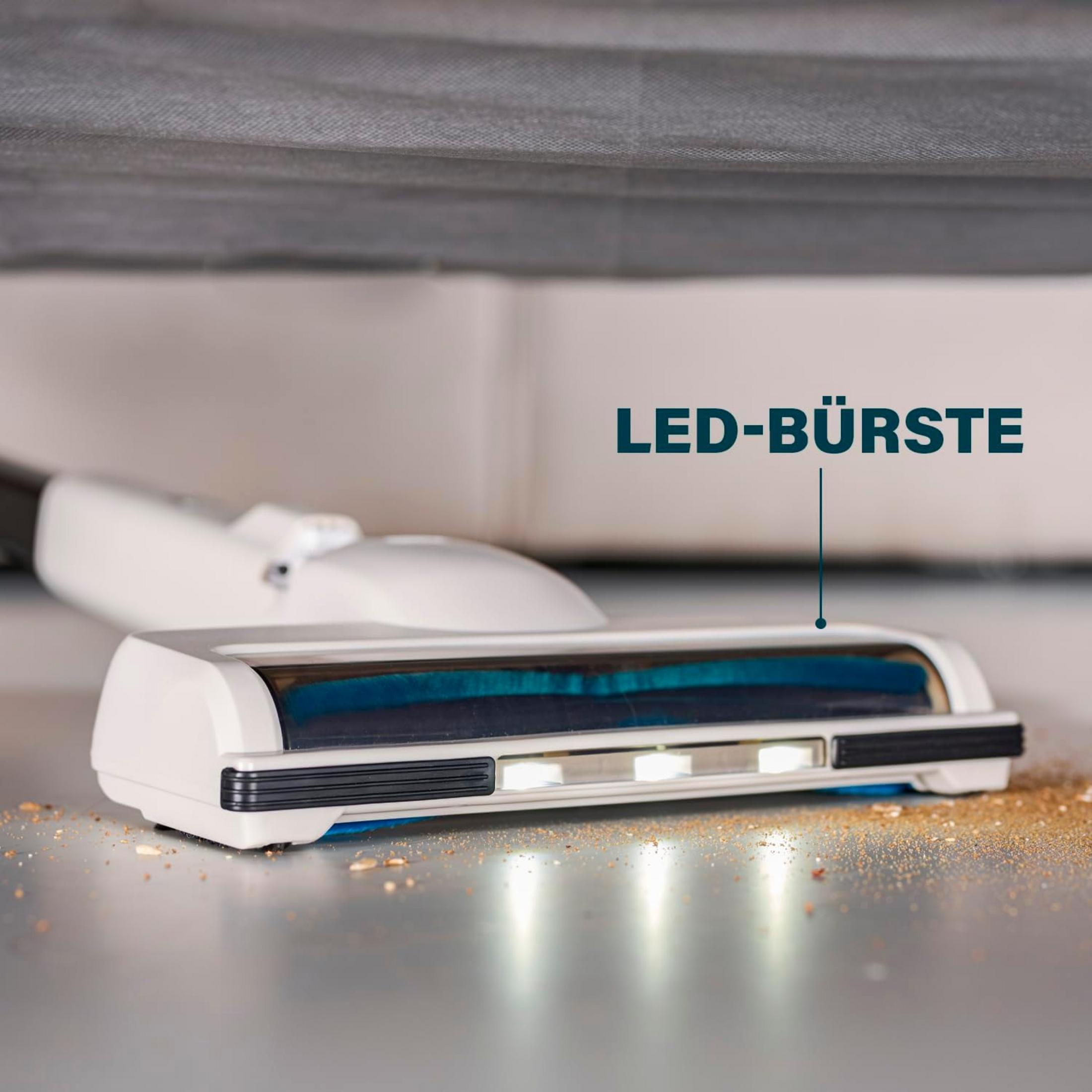 Spazzola con LED pulisce briciole sul pavimento.