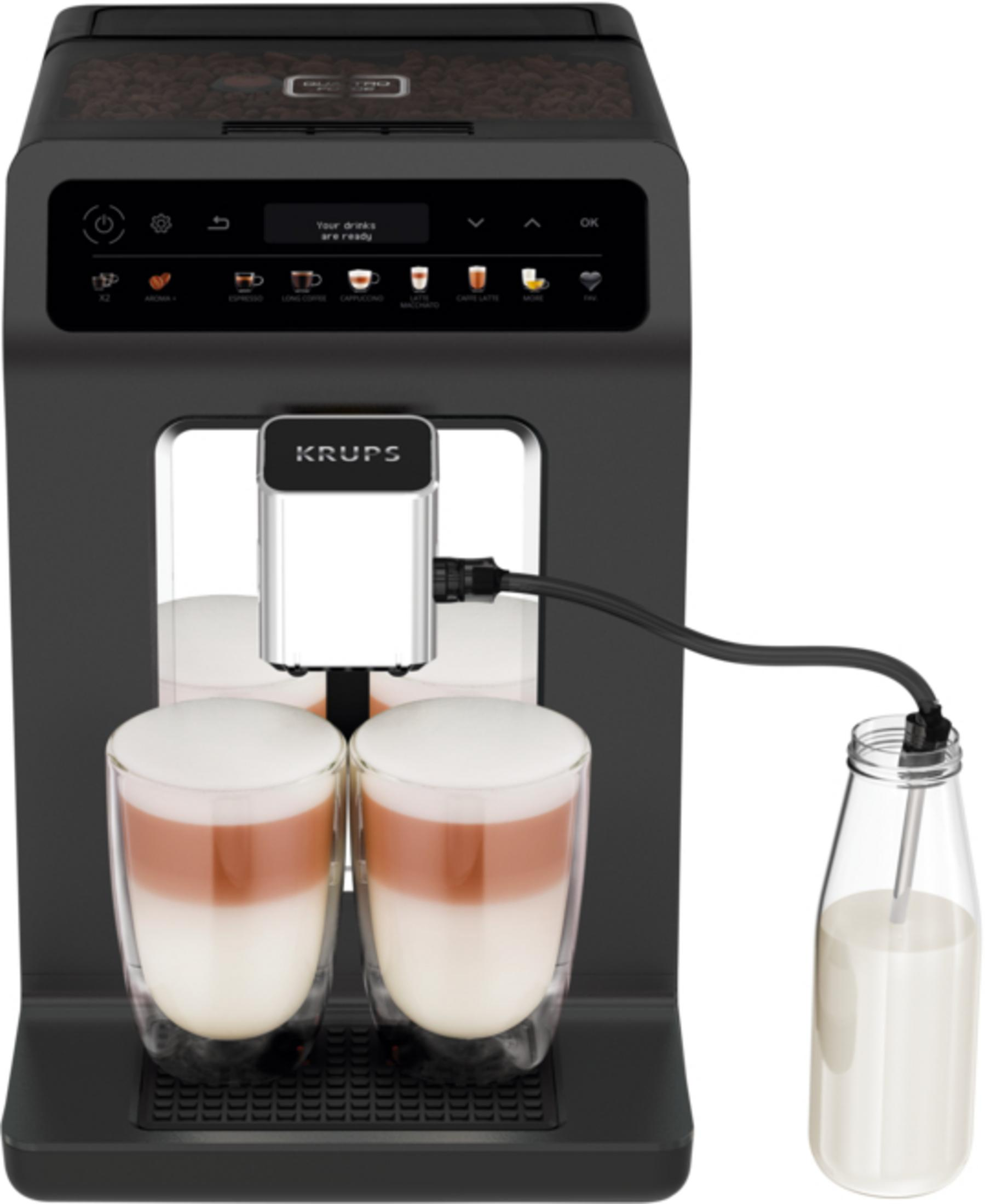 Krups Kaffeemaschine mit zwei Latte-Gläsern und Milchflasche.