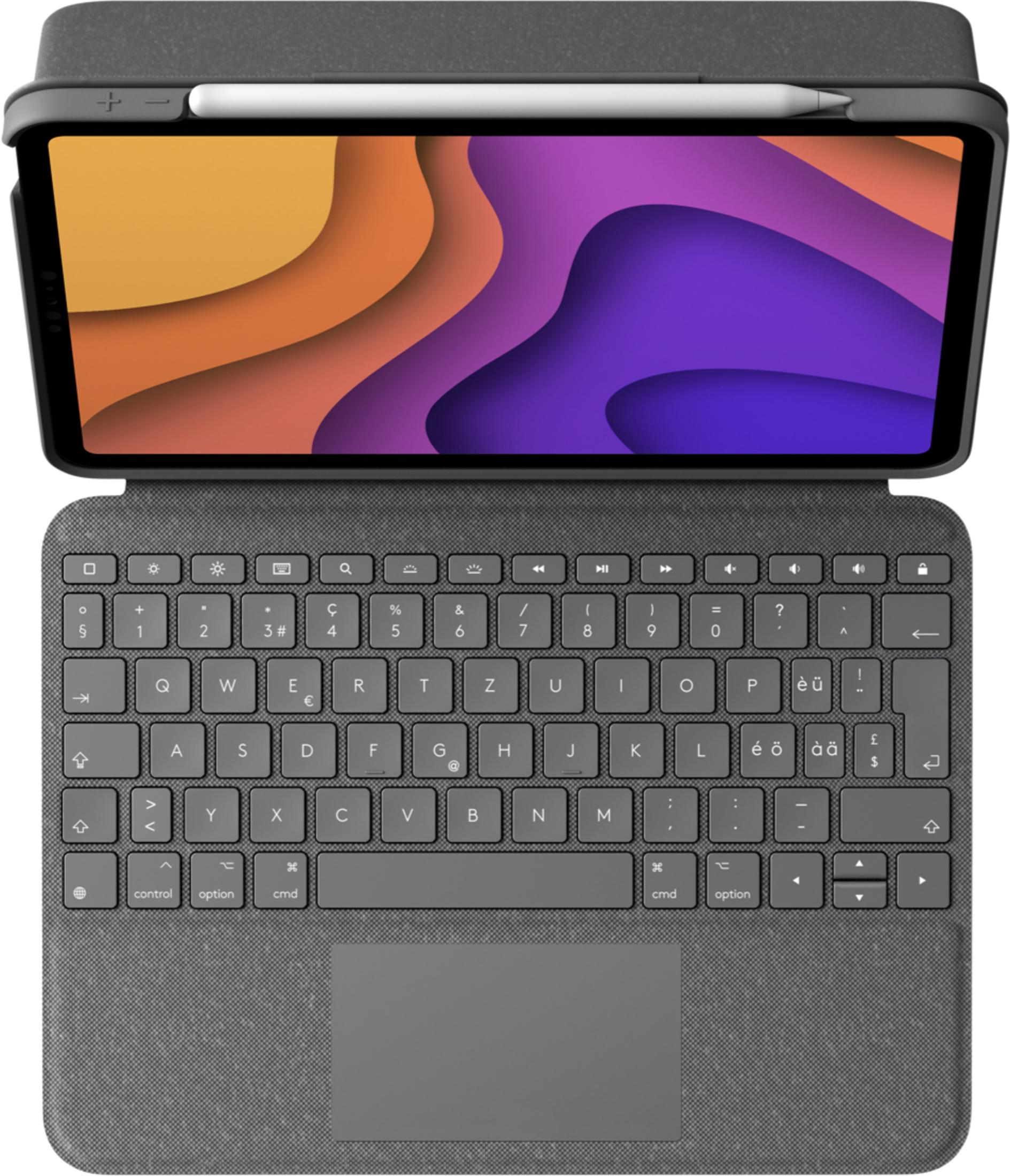 Un tablet grigio con tastiera e stilo. Lo schermo mostra onde colorate.