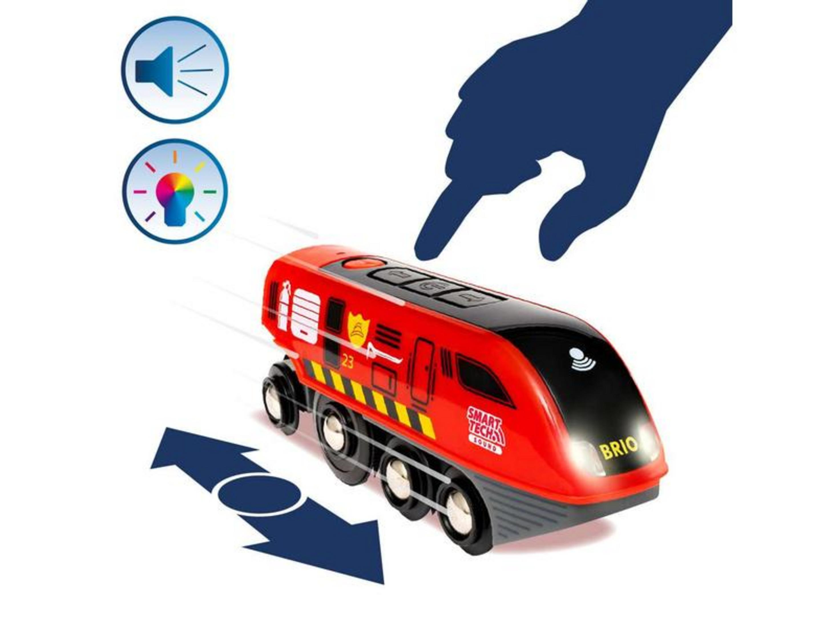 Czerwony pociąg Brio z ikonami światła i dźwięku. Dotyka go ręka.