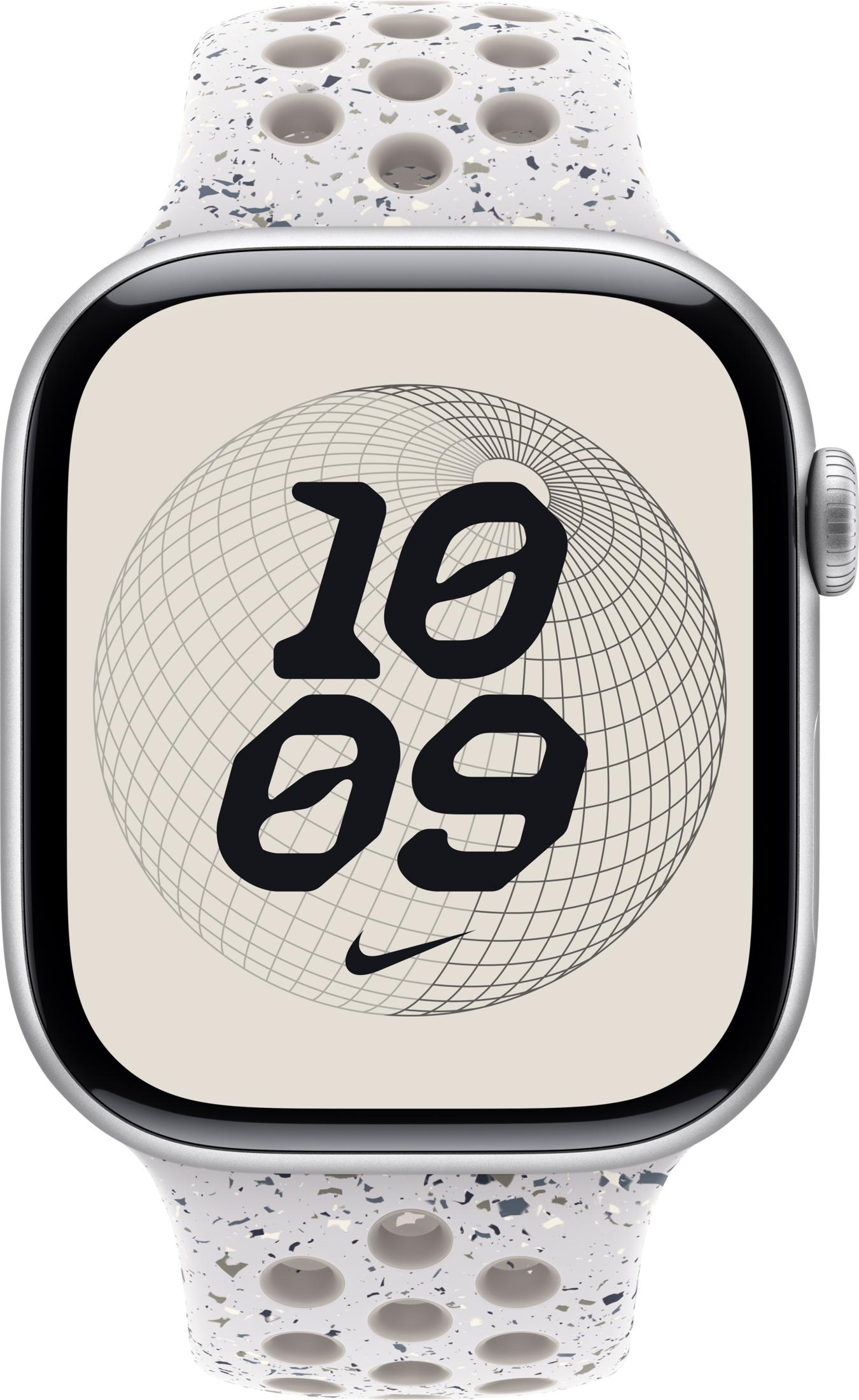 Srebrny smartwatch z białym perforowanym, cętkowanym paskiem.