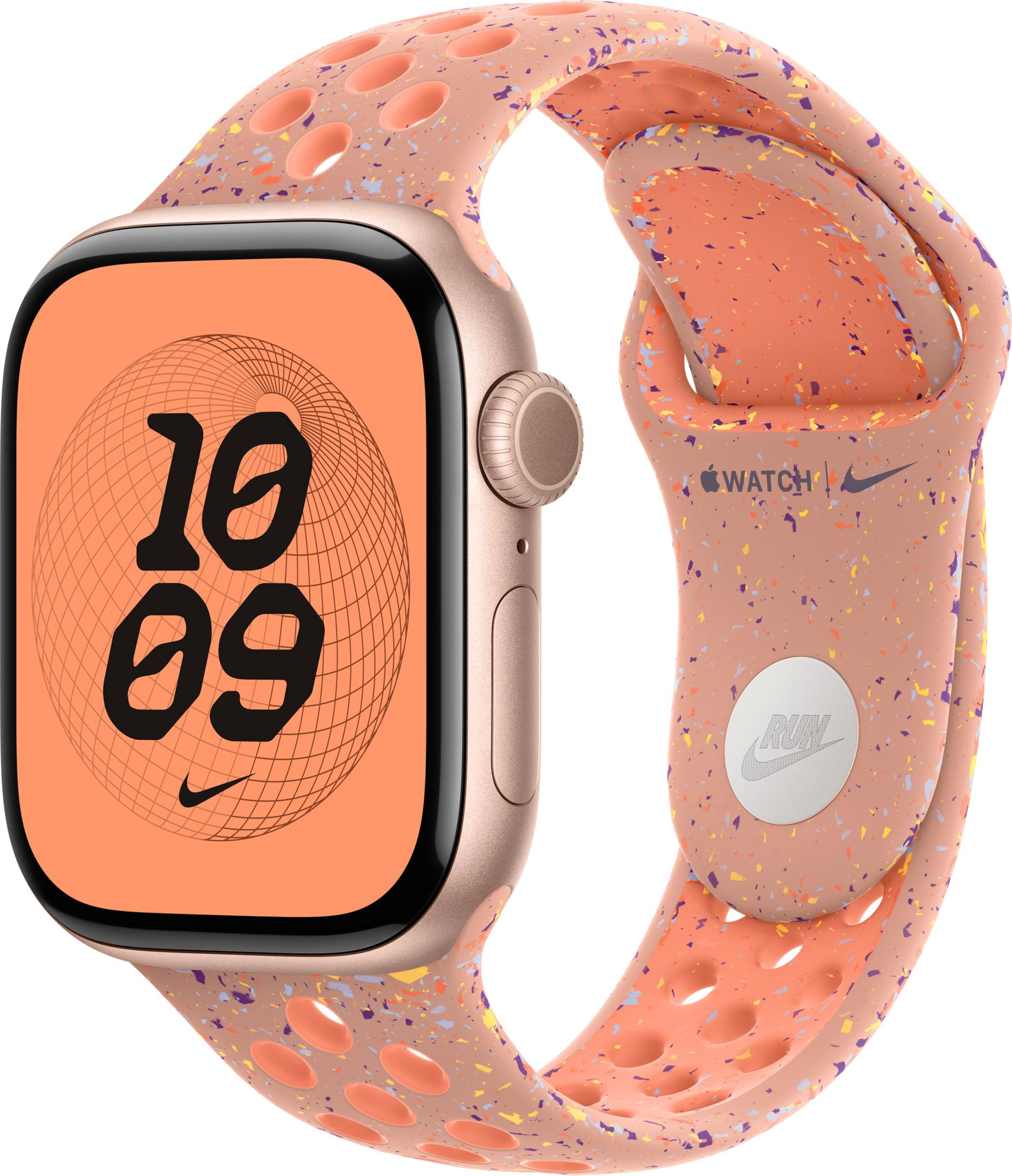 Różowy Apple Watch w cętkowaną bransoletą i pomarańczową tarczą.