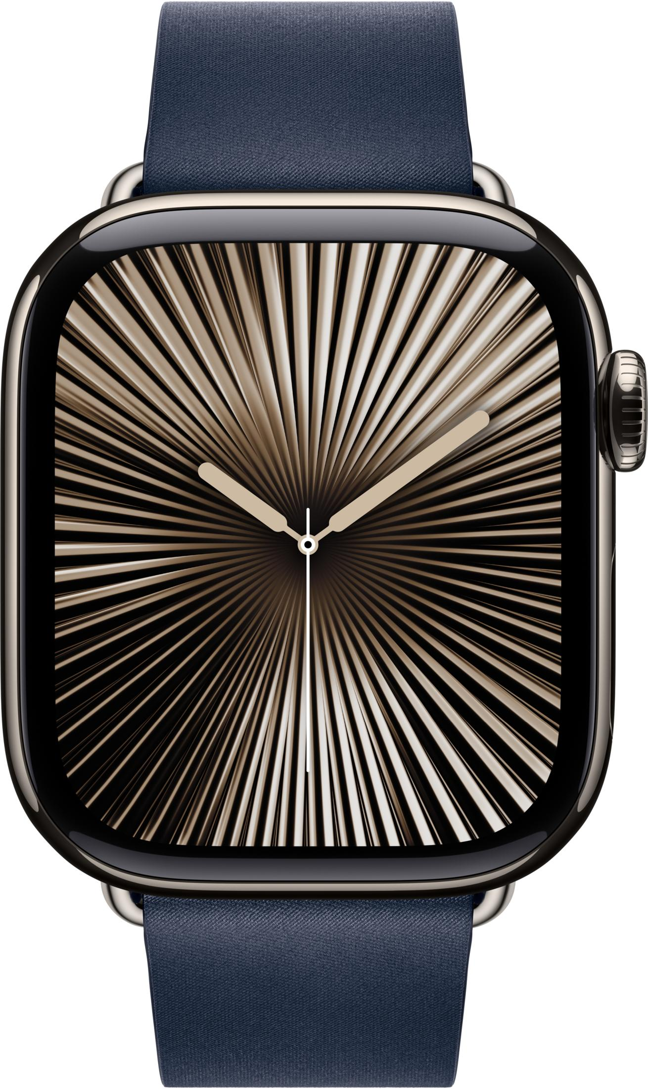 Złoty zegarek z ciemną tarczą i niebieskim paskiem.