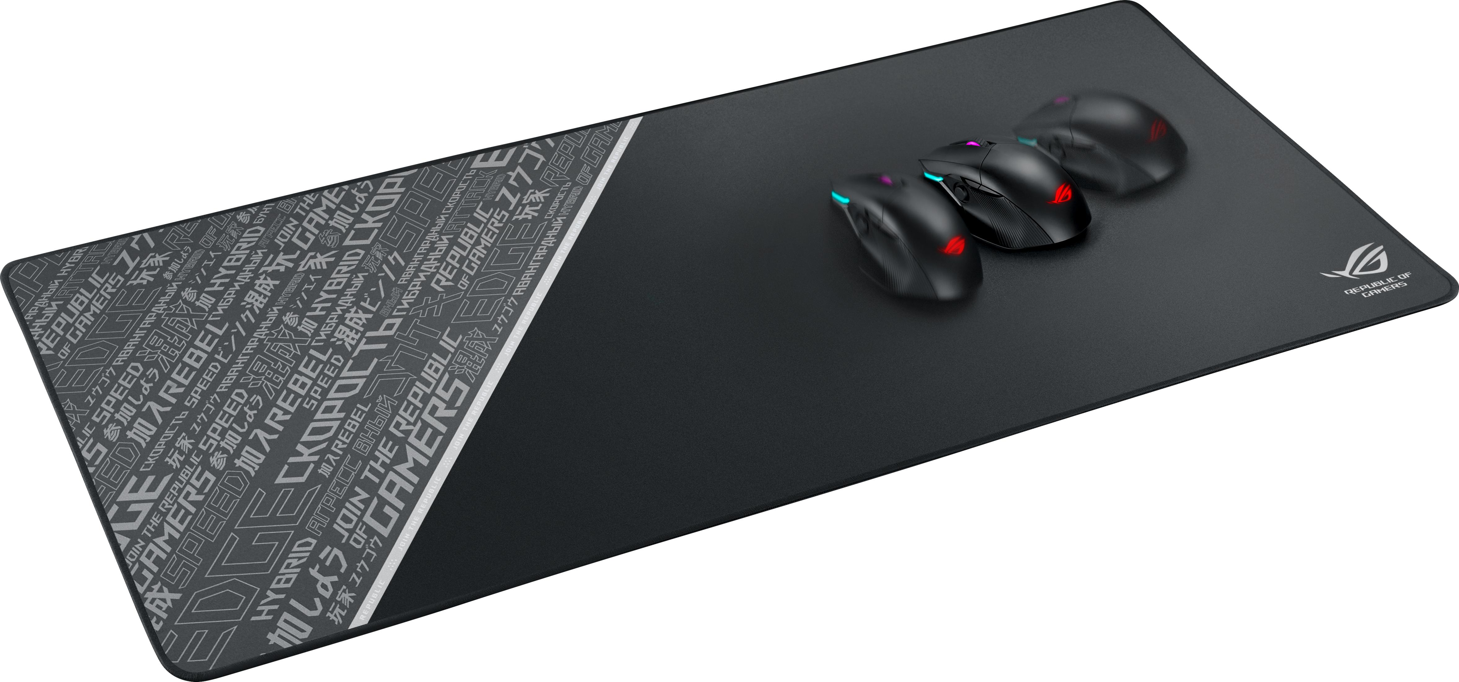 Trzy myszy gamingowe na czarnej podkładce pod mysz z logo ROG.