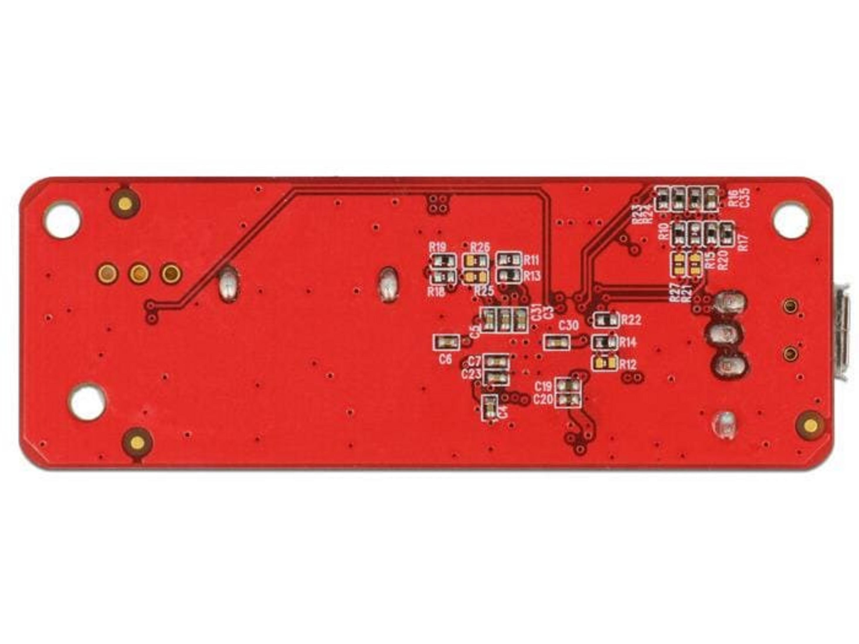 Una scheda rossa con molti componenti elettronici ed etichette.
