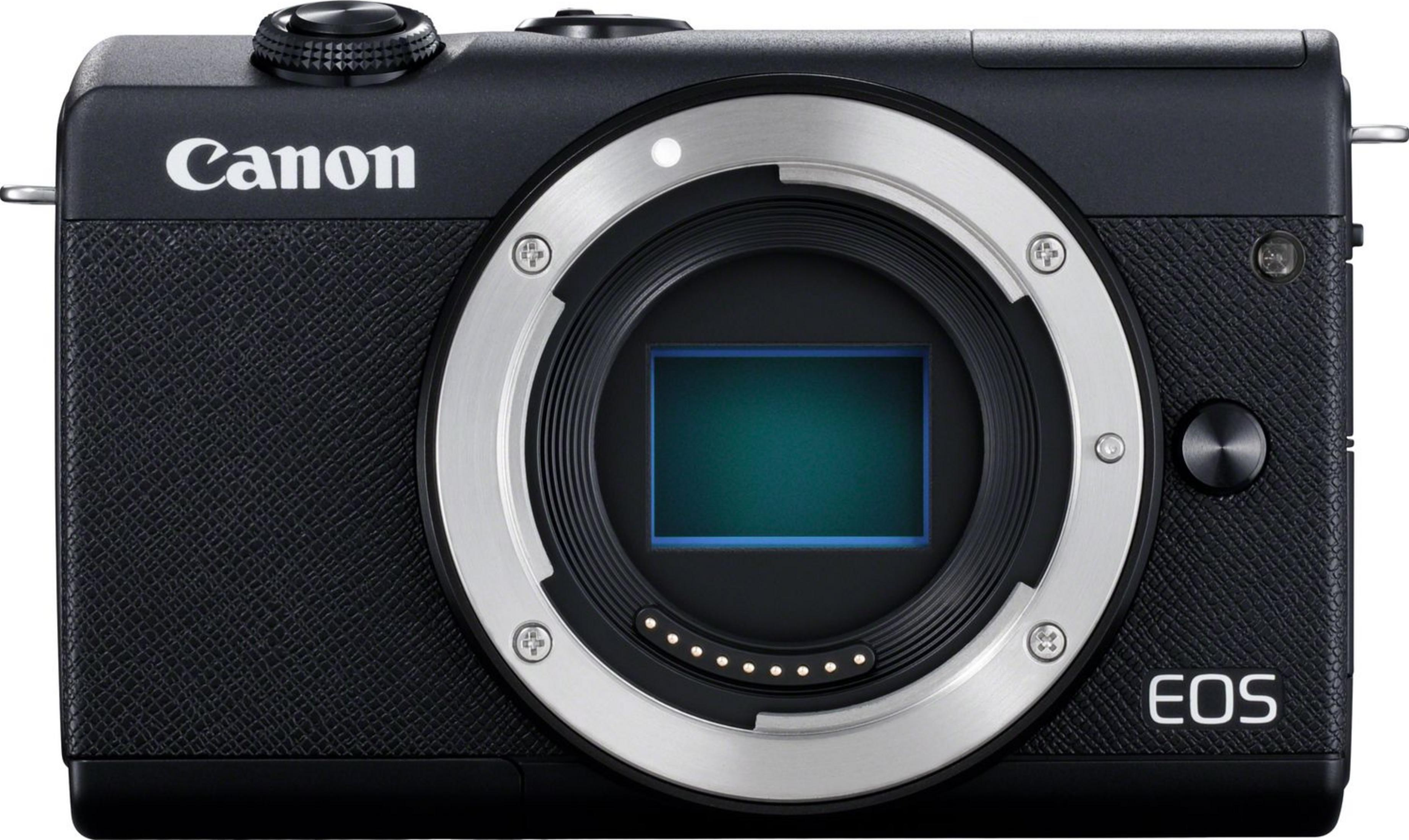 Eine schwarze Canon EOS Kamera mit silbernem Objektivbajonett und offenem Sensor.