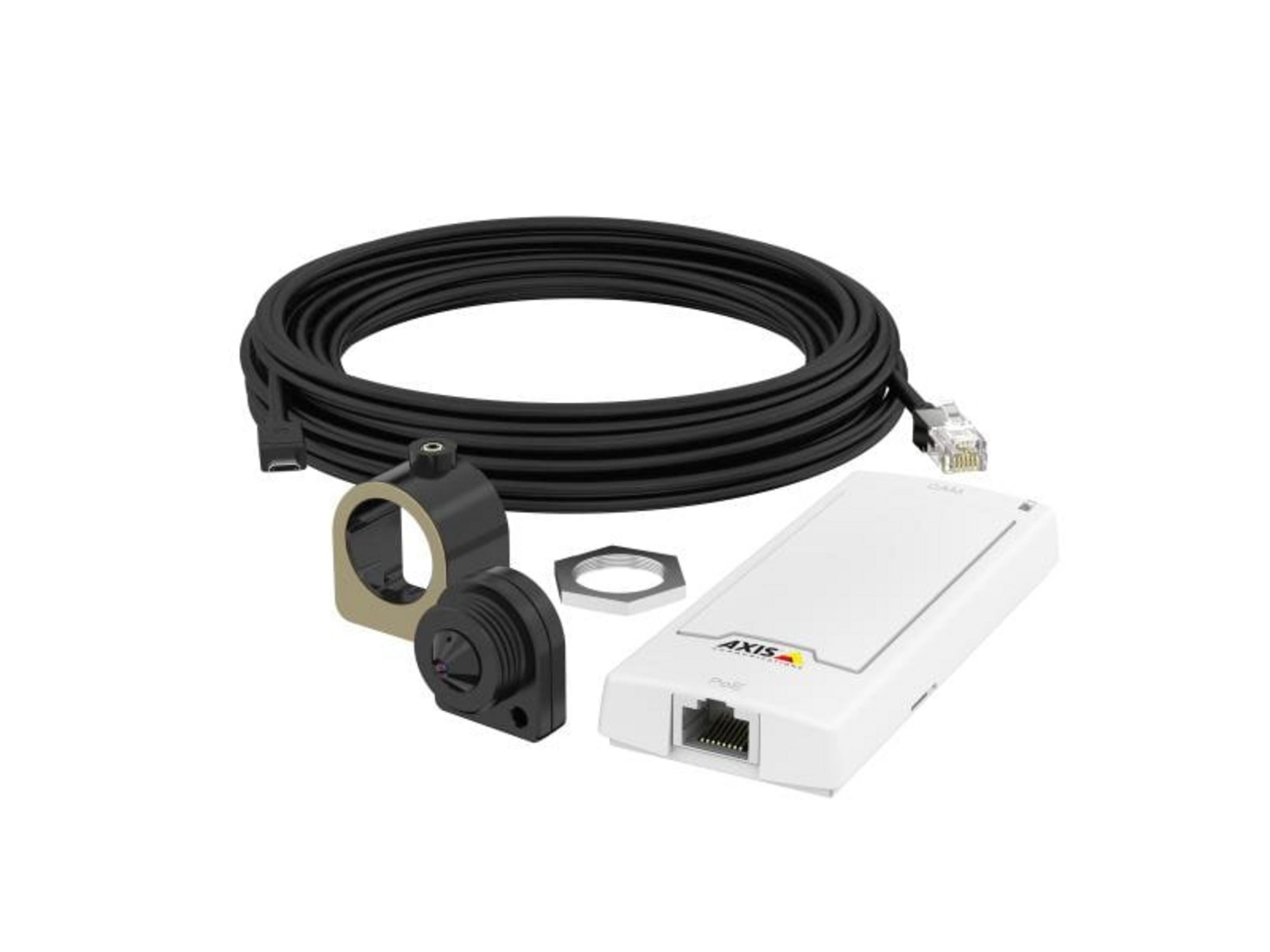 Czarny kabel, kamera i białe urządzenie leżą na białej powierzchni.