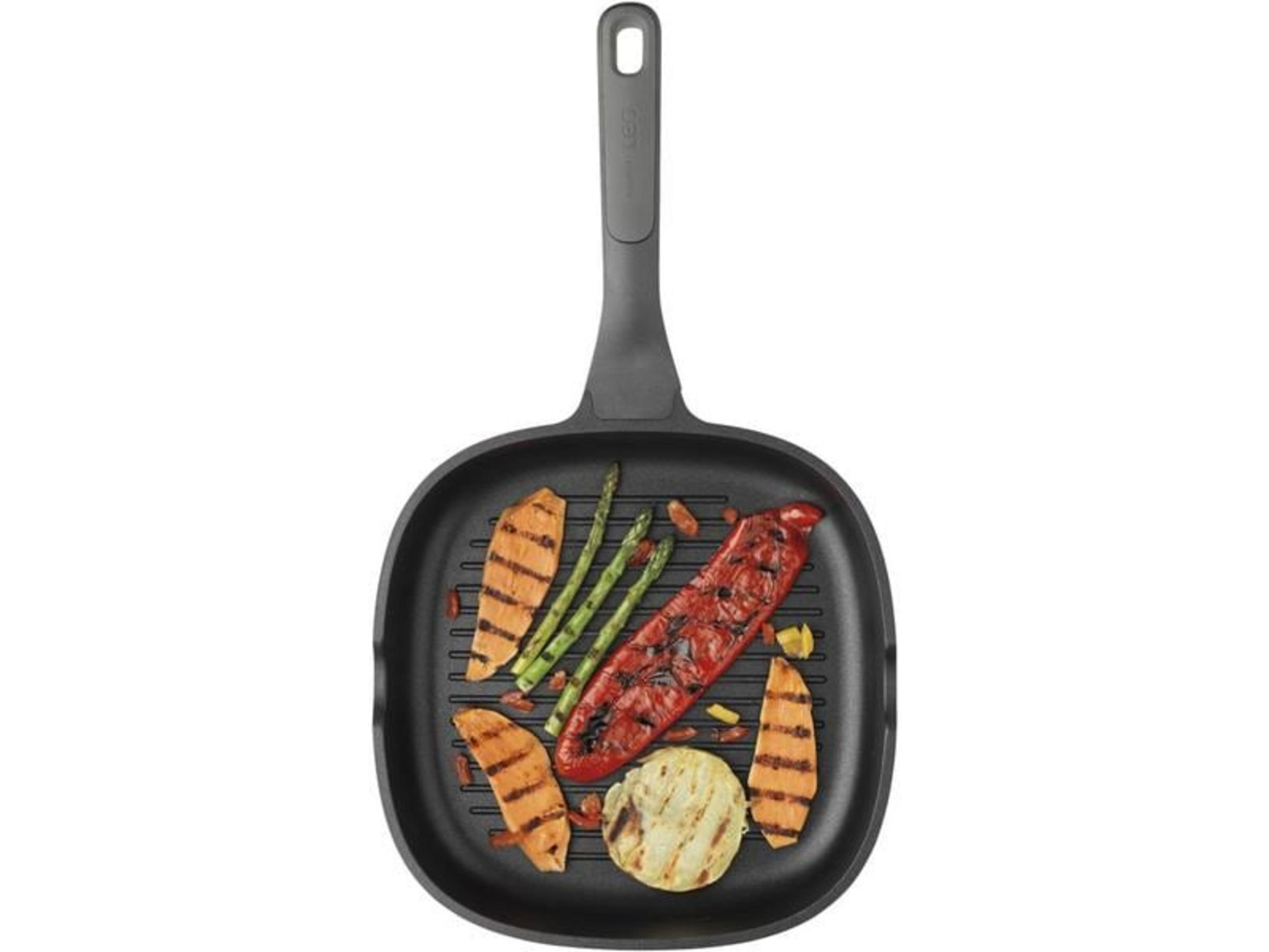 Grill pan with grilled vegetables and sweet potato slices.