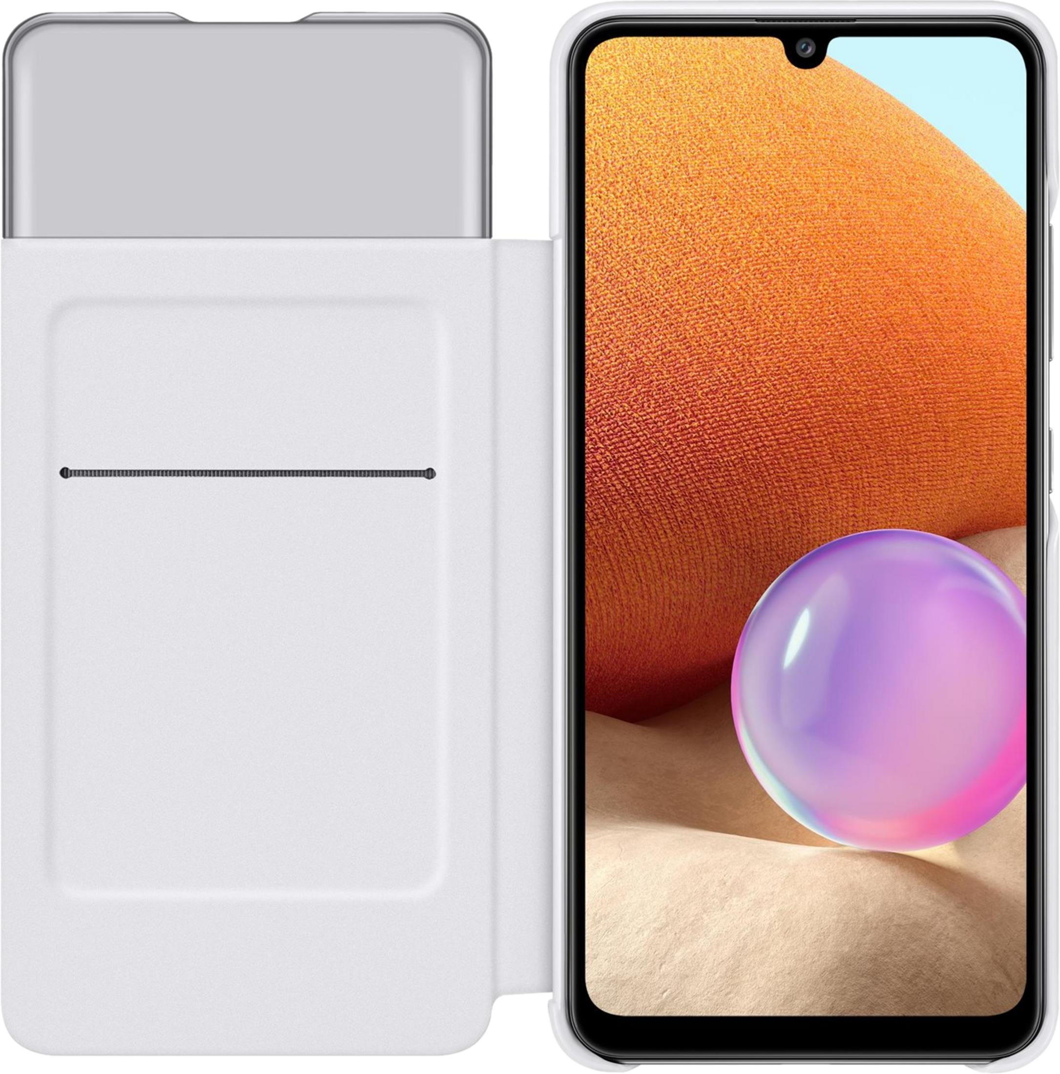 Un teléfono blanco con funda abierta, sobre una superficie marrón claro.
