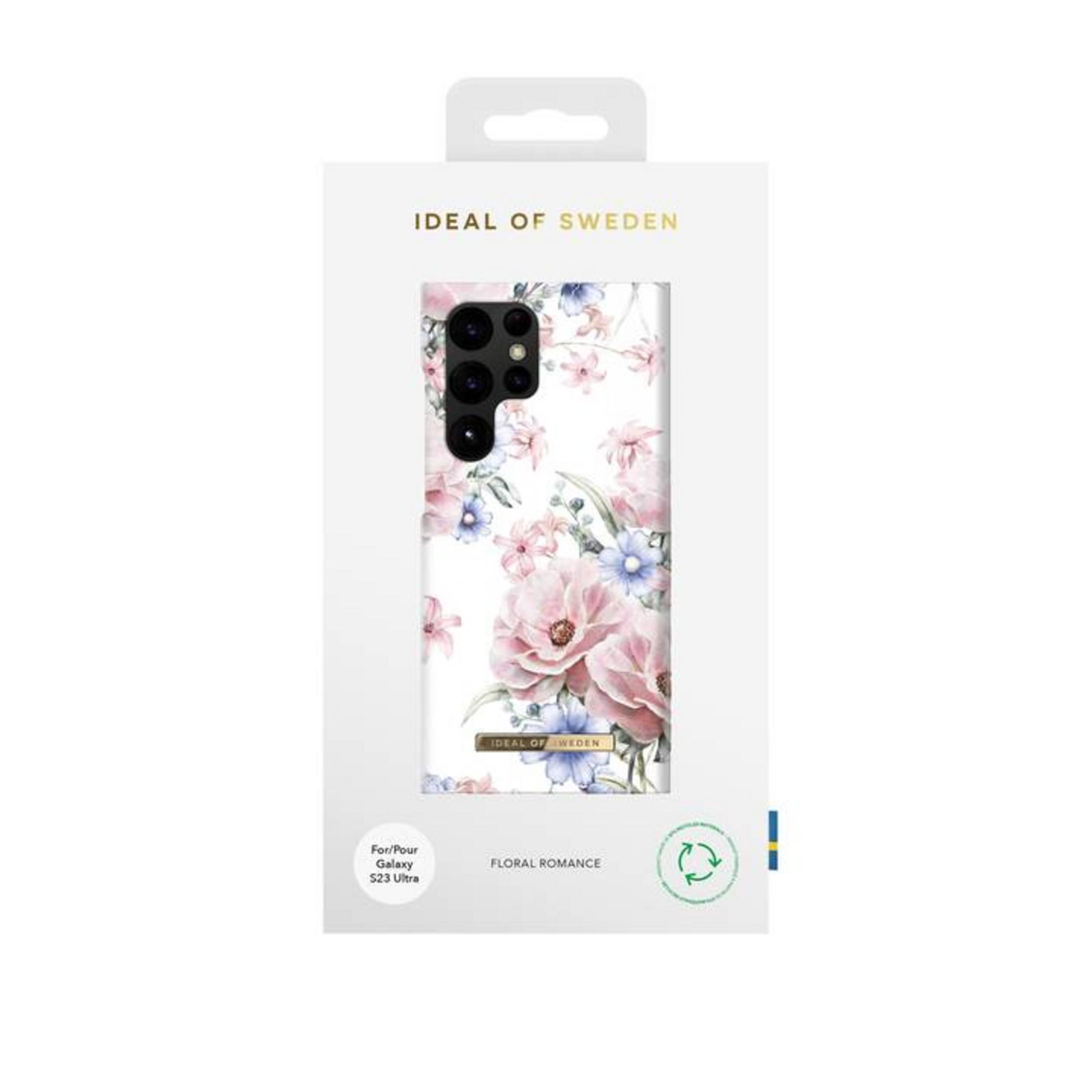 Verpackung für eine Handyhülle mit Blumenmuster in Rosa und Blau.