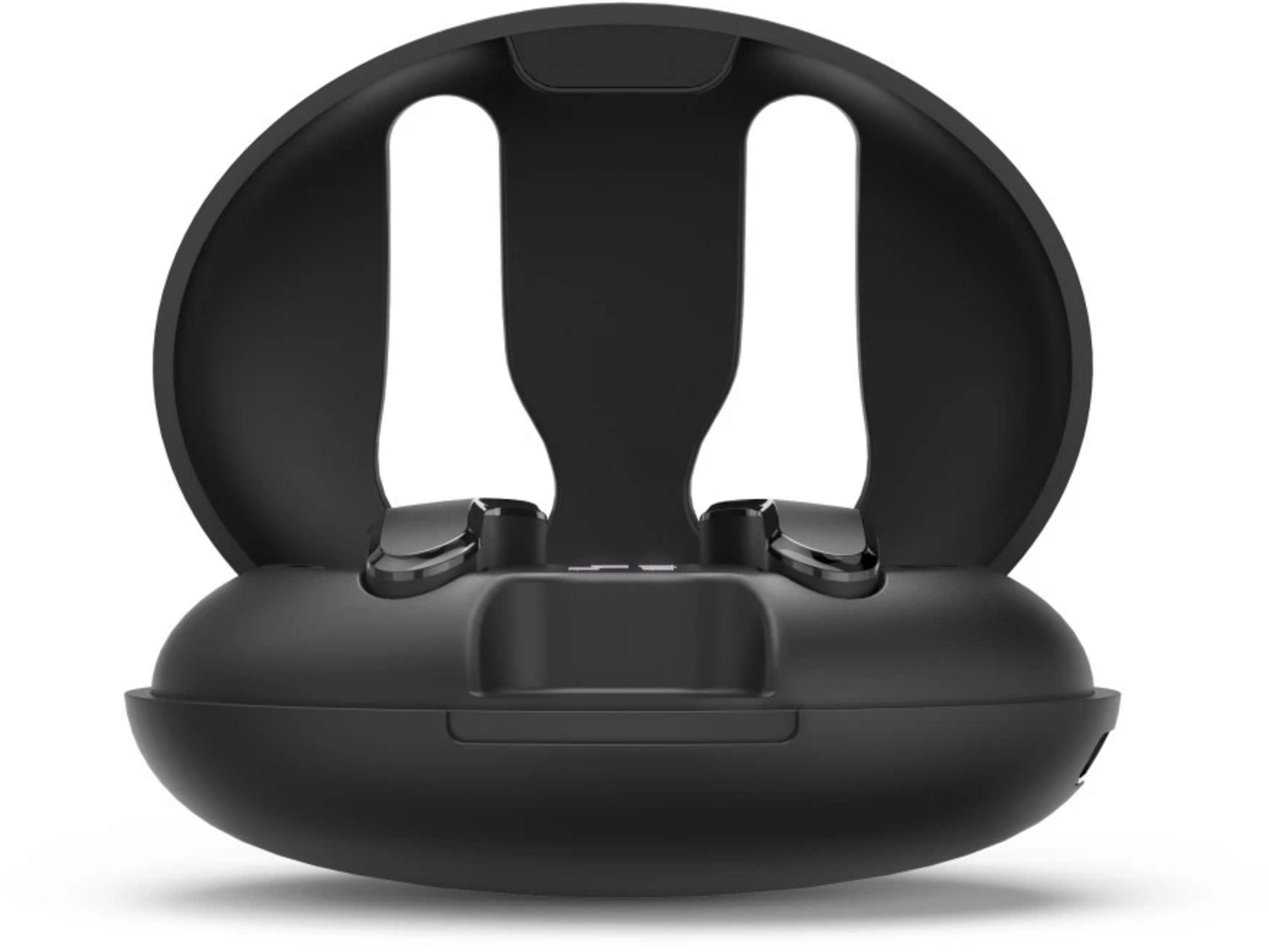 Otwarta czarna ładowarka do słuchawek, pokazująca dwa miejsca.