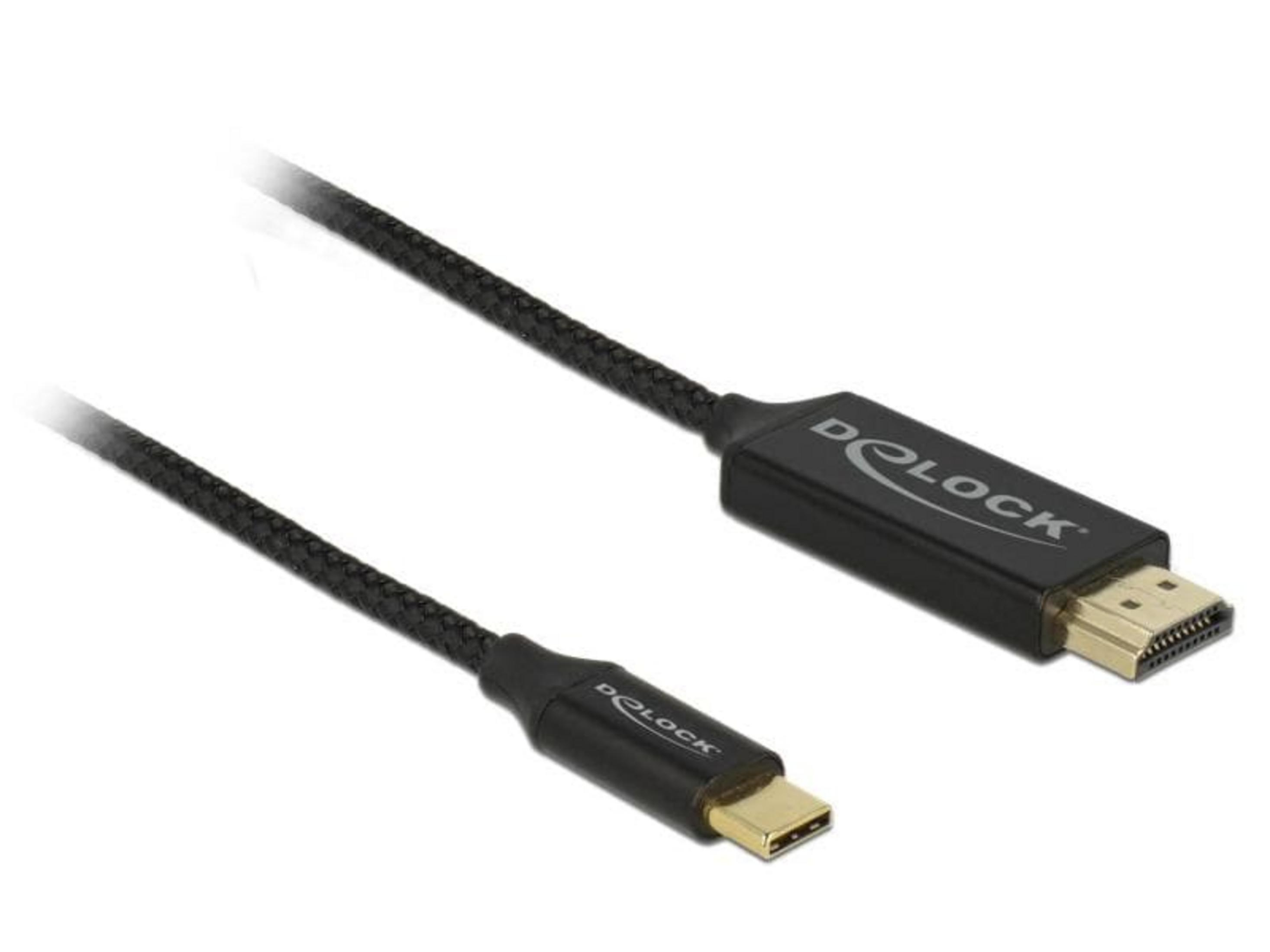 Ein schwarzes Kabel mit USB-C und HDMI-Anschlüssen, auf weißem Hintergrund.