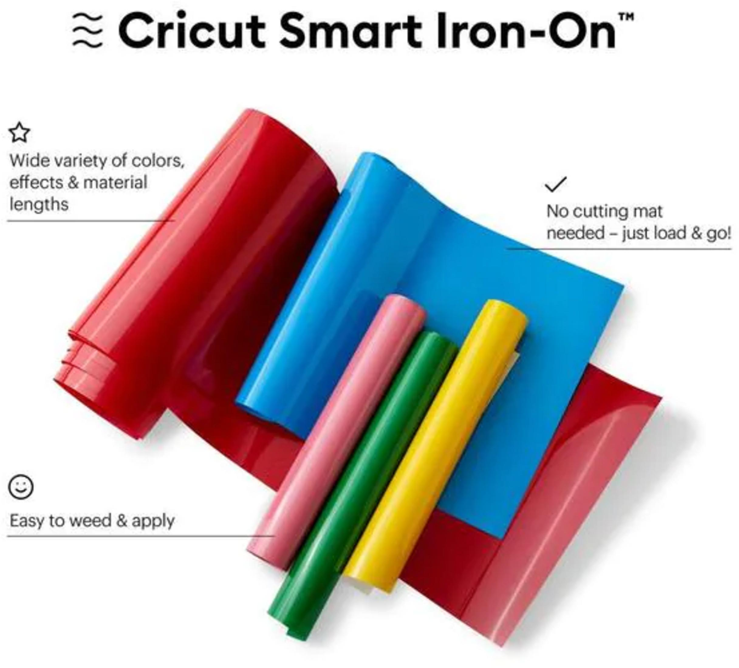 Rollen von Cricut Smart Iron-On in Rot, Blau, Pink, Grün und Gelb.