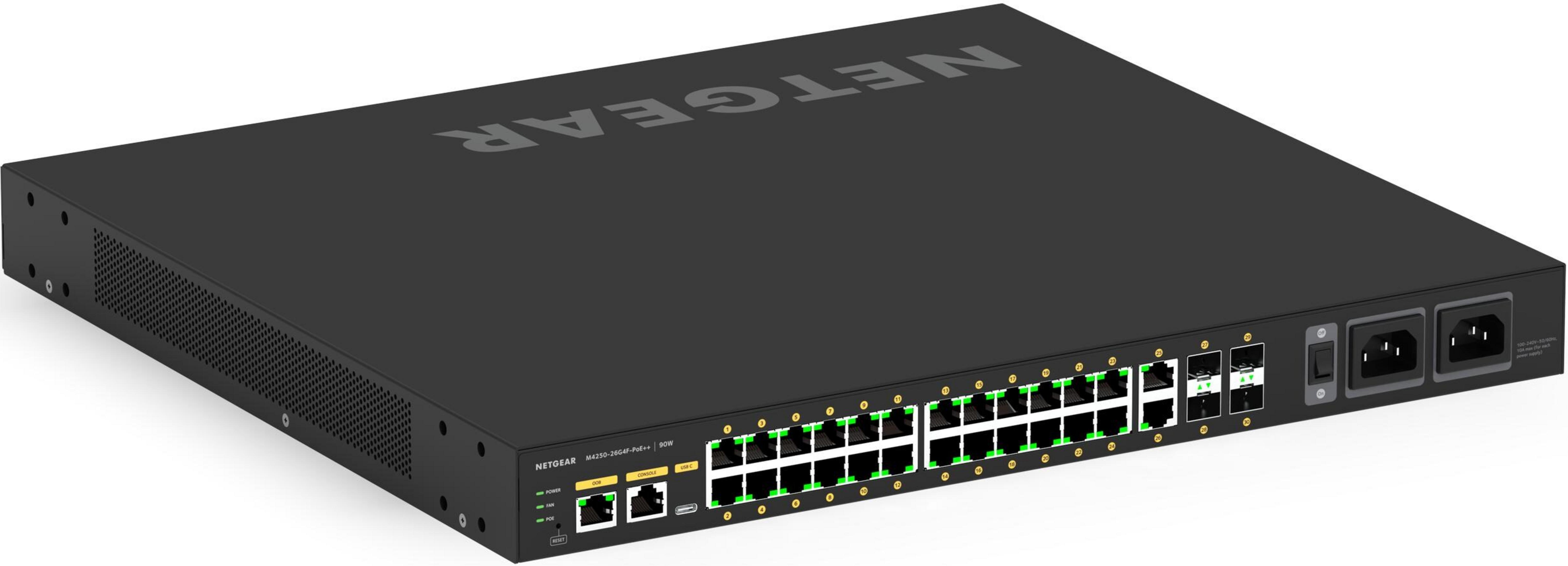 Czarny przełącznik sieciowy Netgear z 26 portami i dwoma złączami zasilania.