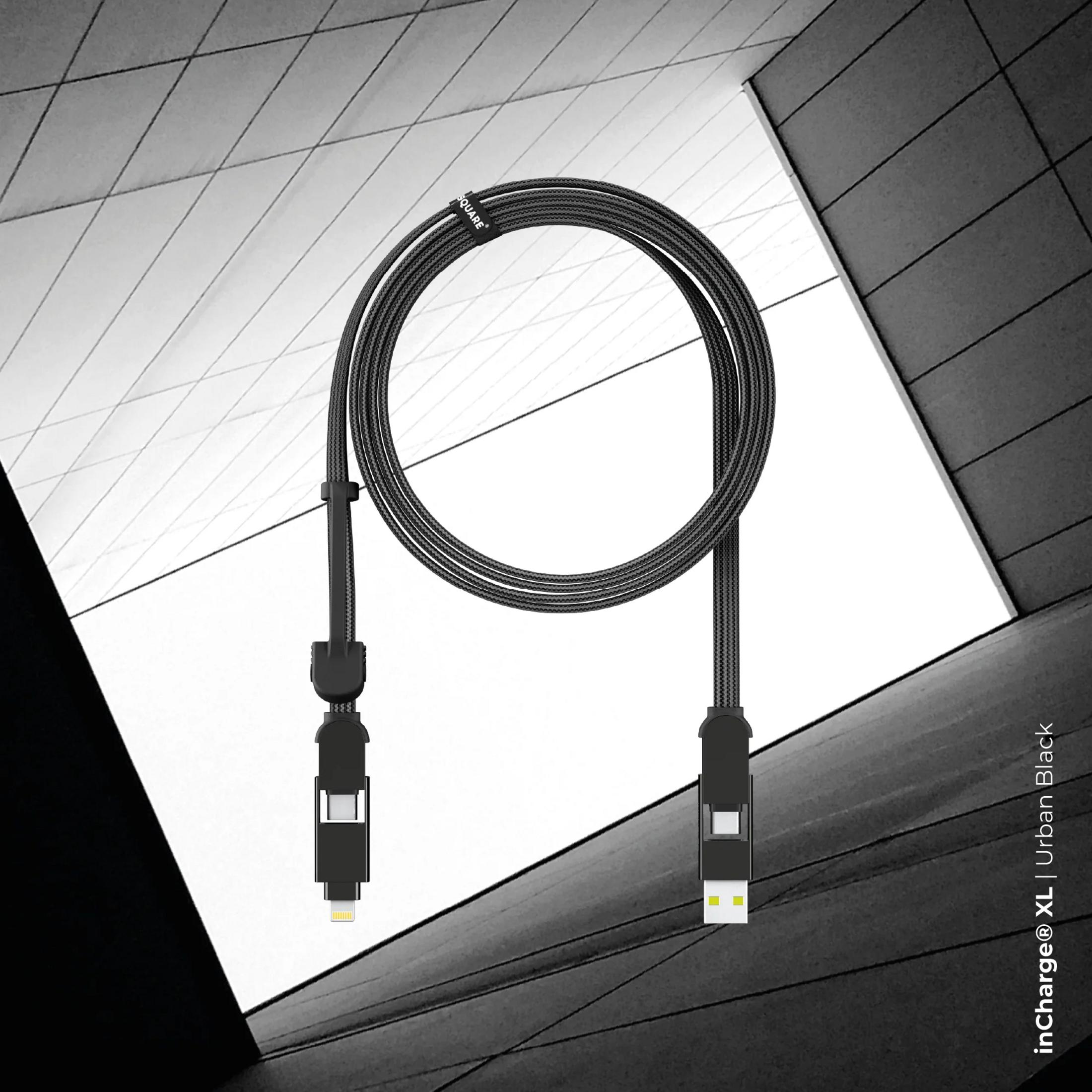 Un câble de chargement noir en boucle sur un bâtiment moderne.