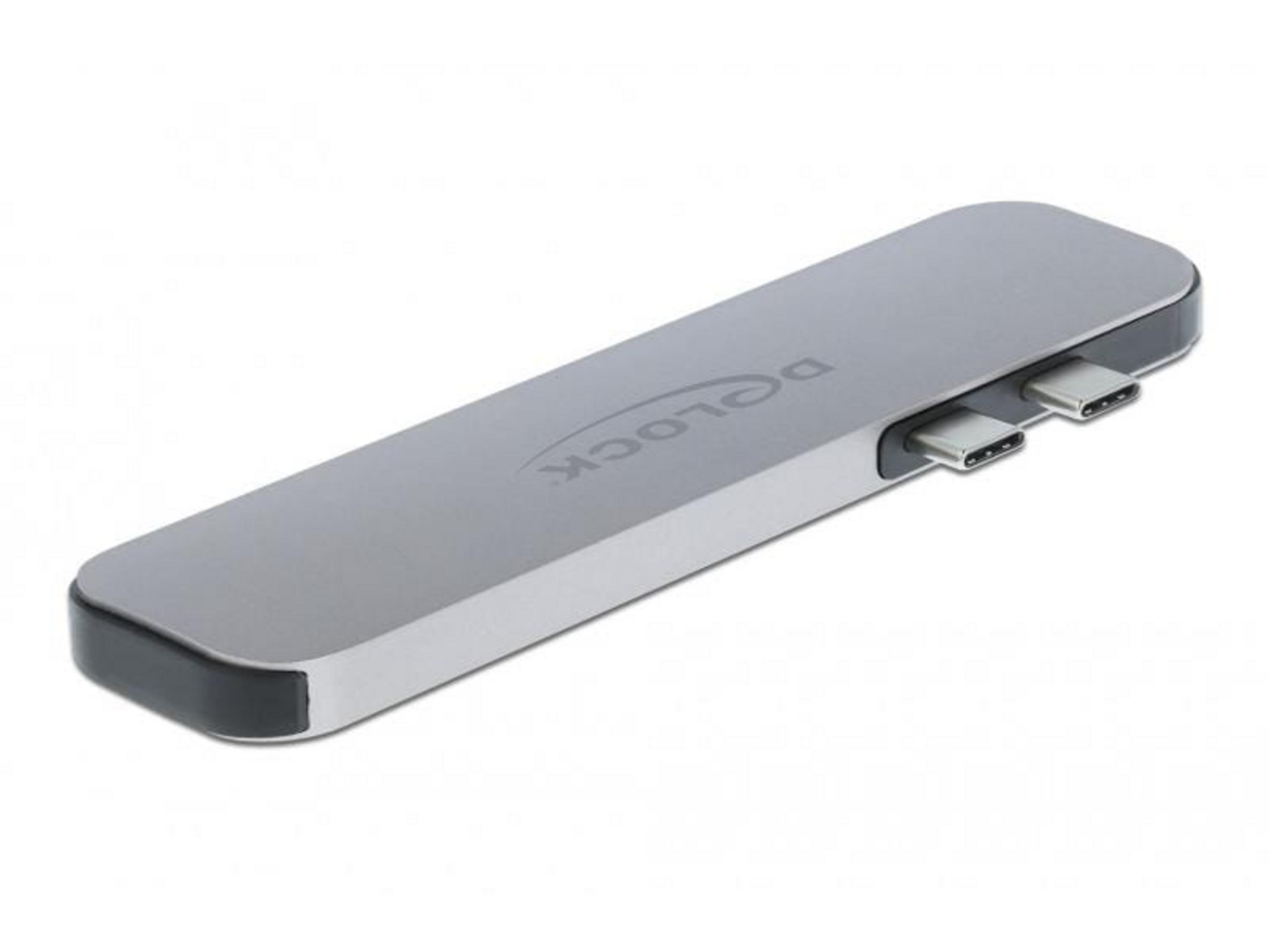 Grauer USB-C-Hub mit zwei Anschlüssen auf weißem Hintergrund.
