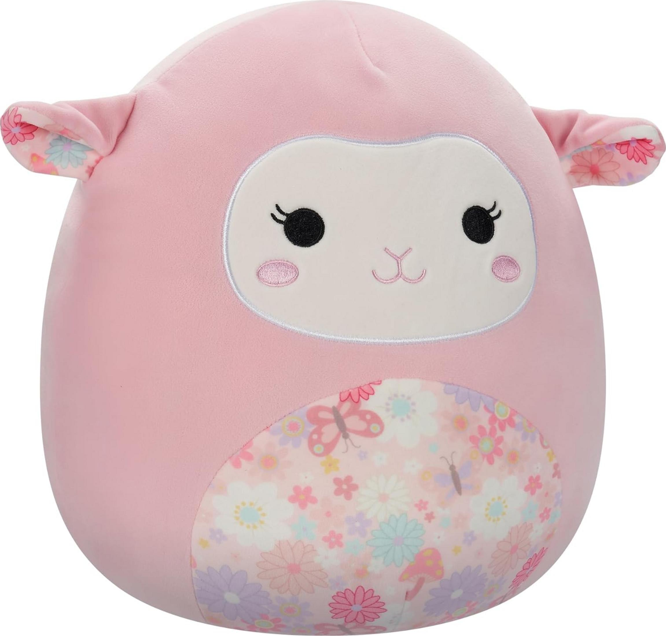 Una pecora Squishmallow rosa con fiori e farfalle sulla pancia.